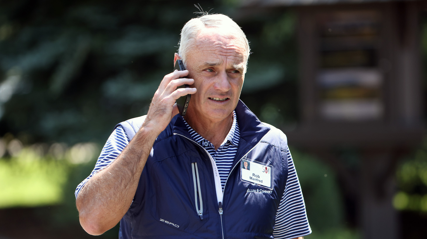 SUN VALLEY, IDAHO - JULY 08: Major League Baseball Commissioner Rob Manfred walks to a session at the Allen &amp; Company Sun Valley Conference on July 08, 2021 in Sun Valley, Idaho. After a year hiatus due to the COVID-19 pandemic, the world’s most wealthy and powerful businesspeople from the media, finance, and technology worlds will converge at the Sun Valley Resort for the exclusive week-long conference. (Photo by Kevin Dietsch/Getty Images)