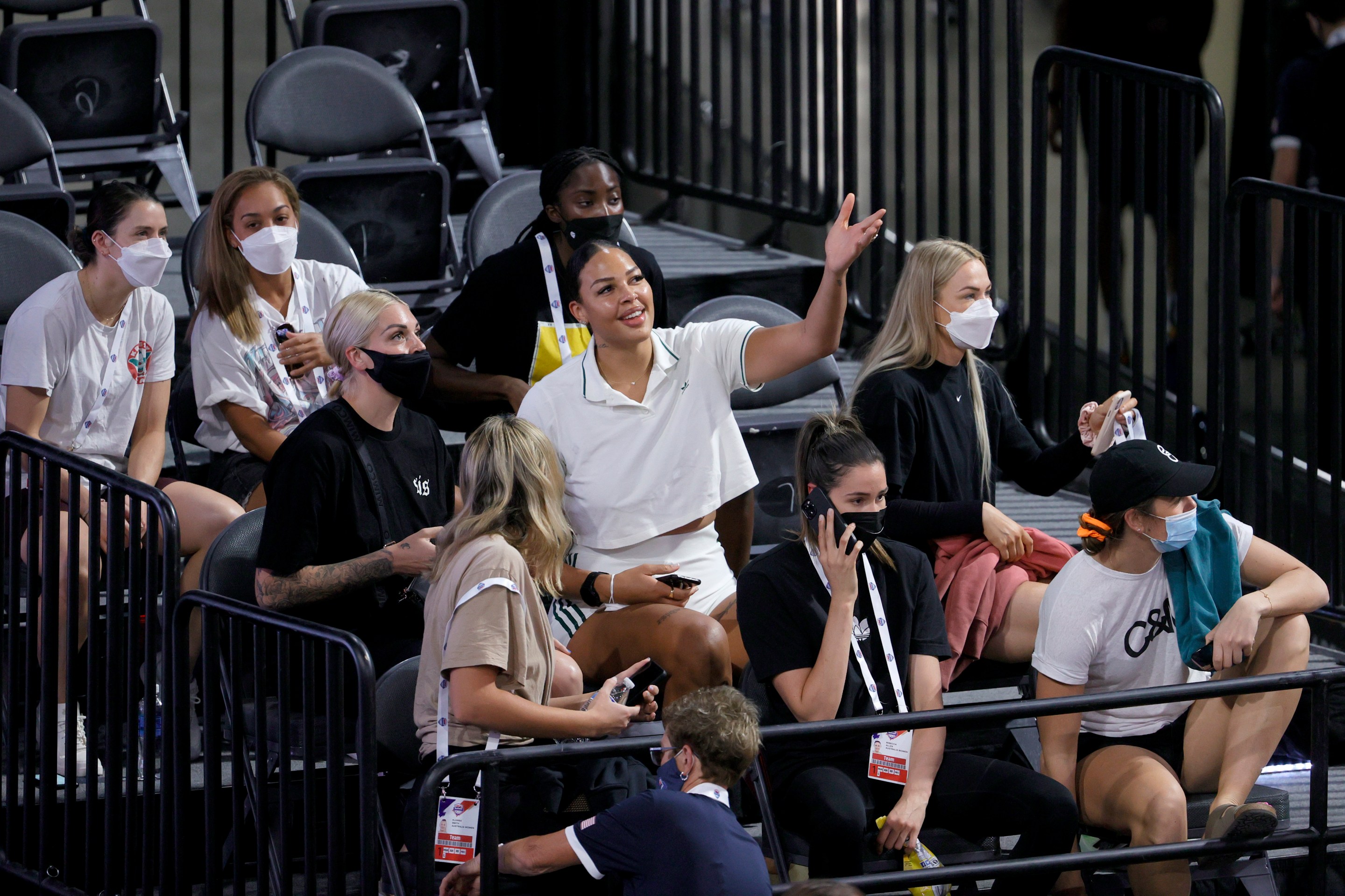 Liz Cambage (C) of the Las Vegas Aces attends an exhibition game between Nigeria and the United States at Michelob ULTRA Arena ahead of the Tokyo Olympic Games on July 10, 2021 in Las Vegas, Nevada.