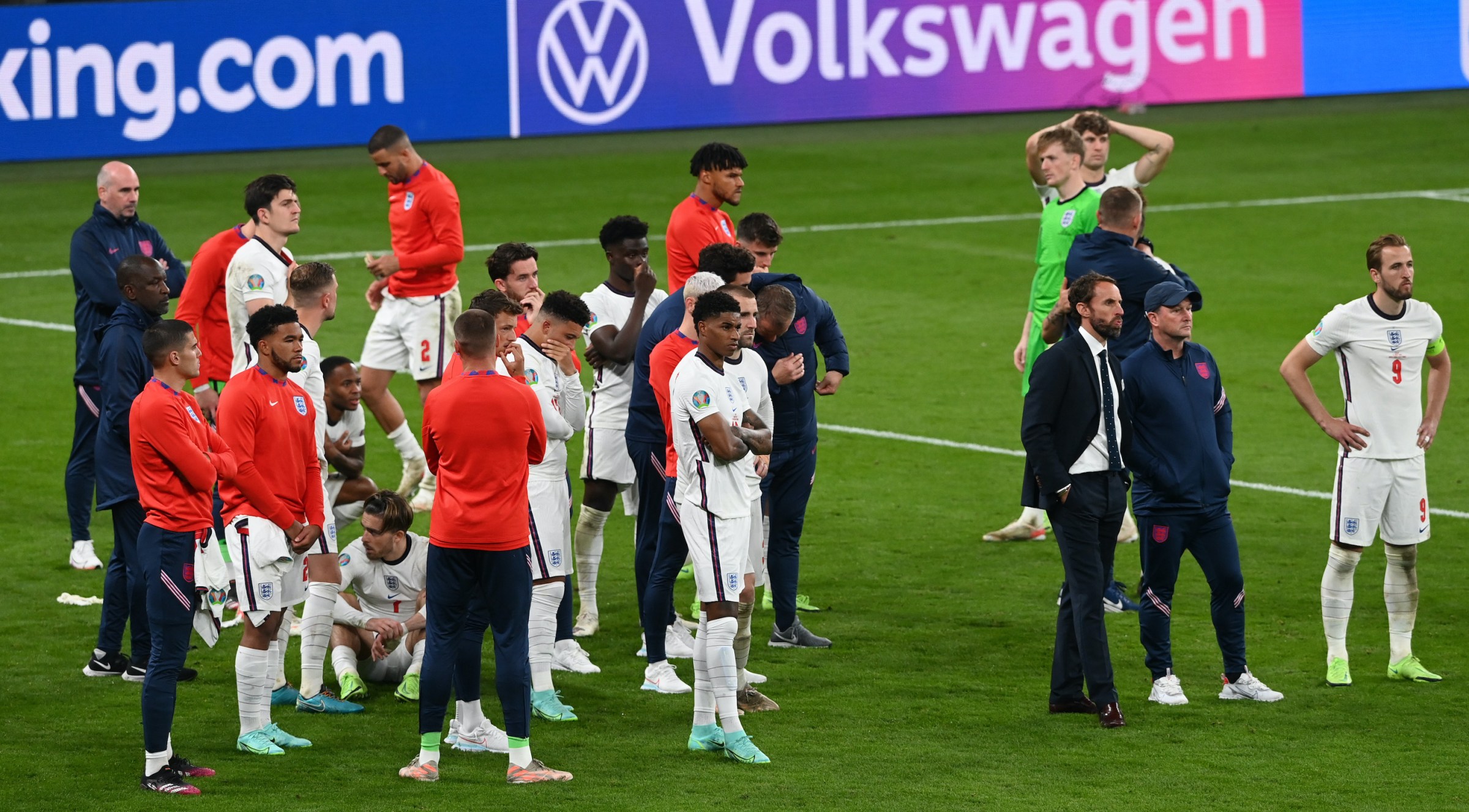 England players look on dejected after losing in the penalty shoot out during the UEFA Euro 2020 Championship Final between Italy and England at Wembley Stadium on July 11, 2021 in London, England.