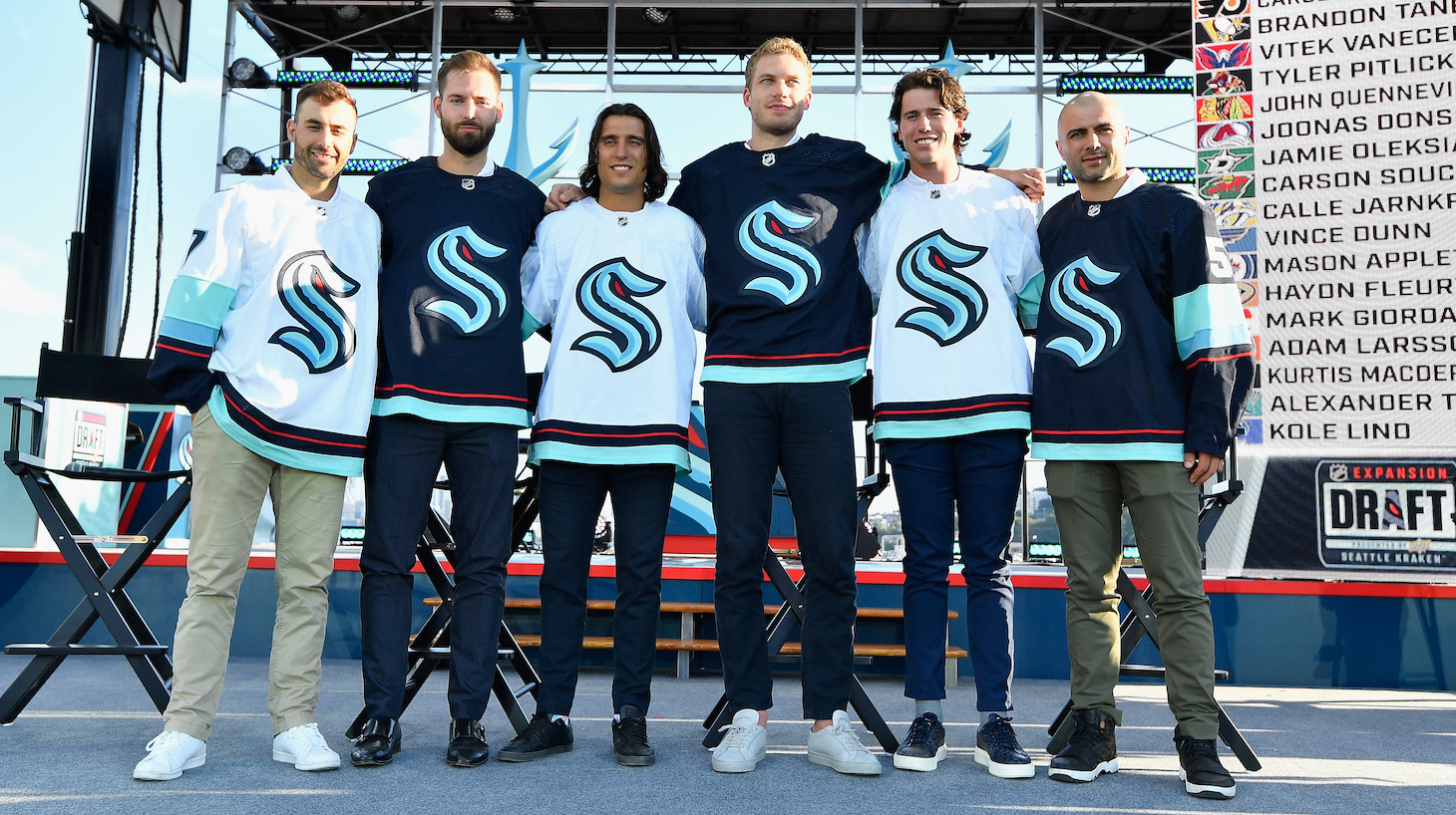 SEATTLE, WASHINGTON - JULY 21: The Seattle Kracken draft picks (L-R) Jordan Eberle, Chris Driedger, Chris Tanev, Jamie Oleksiak, Haydn Fleury and Mark Giordano following the 2021 NHL Expansion Draft at Gas Works Park on July 21, 2021 in Seattle, Washington. The Seattle Kraken is the National Hockey League's newest franchise and will begin play in October 2021. (Photo by Alika Jenner/Getty Images)
