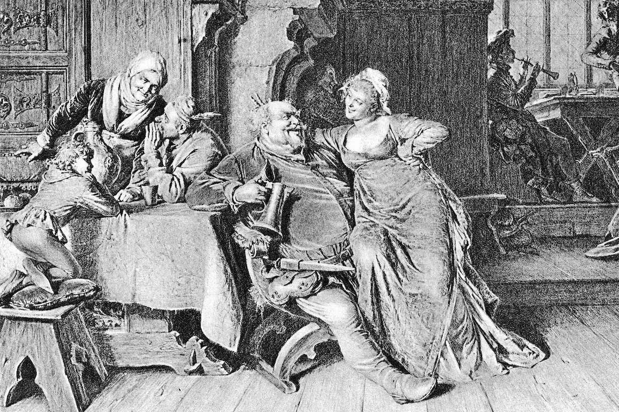 Falstaff sits with a woman, holding a tankard, in an illustrated scene from the Shakespeare play, 'King Henry IV,' Act II, Scene IV. (Kean Collection/Getty Images)