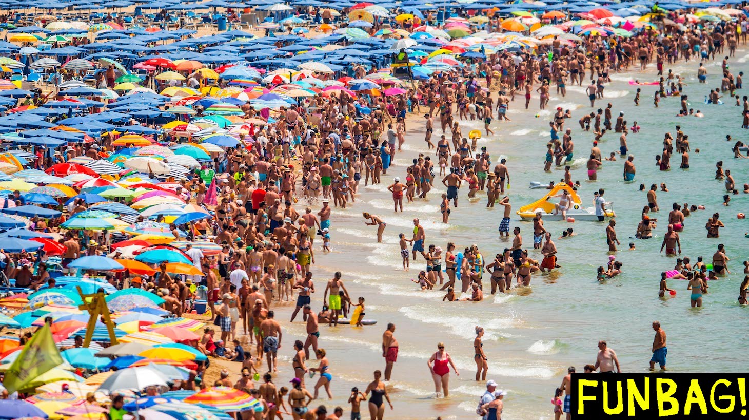 BENIDORM, SPAIN - JULY 22: People sunbathe at Levante Beach on July 22, 2015 in Benidorm, Spain. Spain has set a new record for visitors, with 29.2 million visitors in June, 4.2% more than the same period in 2014. Spain is also expected to be the main destination of tourists seeking a value-for-money all-inclusive holiday after the Tunisia attack. (Photo by David Ramos/Getty Images)