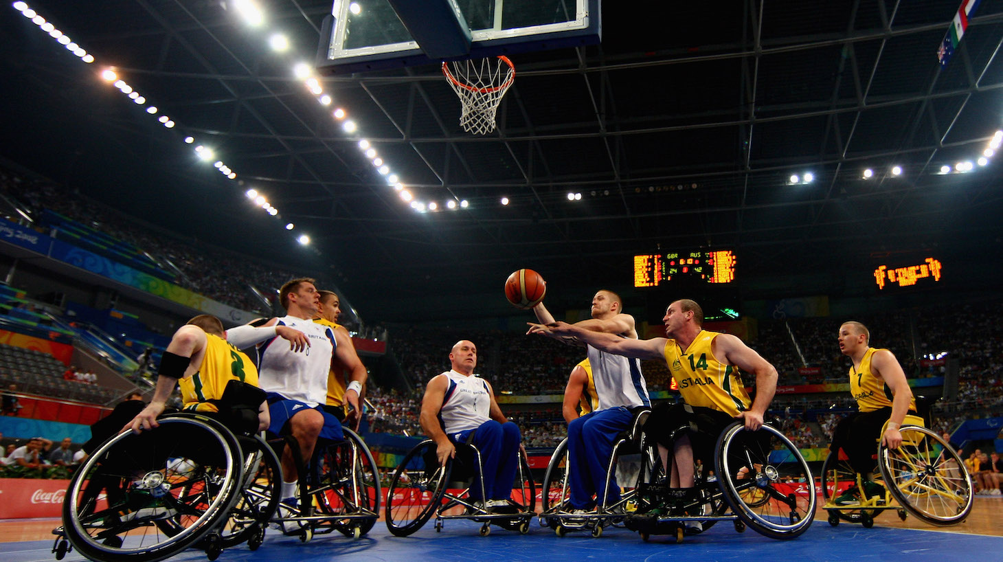 BEIJING - SEPTEMBER 14: Jonathan Hall of Great Britain battles with Brendan Dowler of Australia in the Wheelchair Basketball match between Australia and Great Britain at the National Indoor Stadium during day eight of the 2008 Paralympic Games September 14, 2008 in Beijing, China. (Photo by Jamie McDonald/Getty Images)