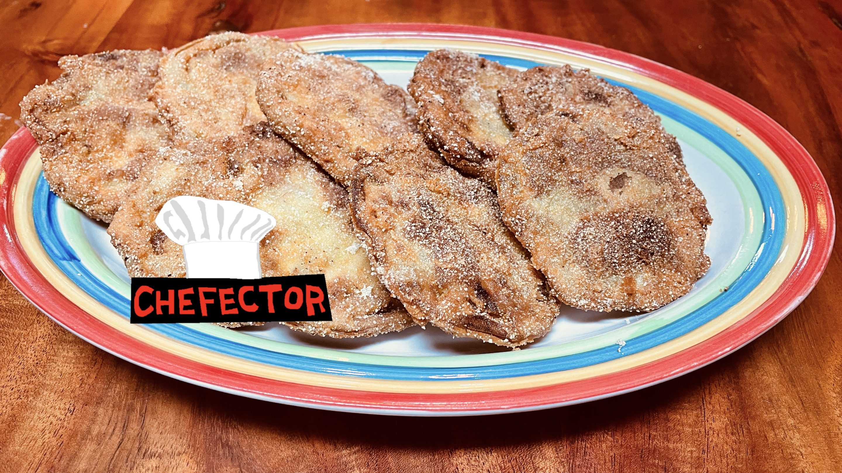 A plate of fried green tomatoes, with a Chefector badge