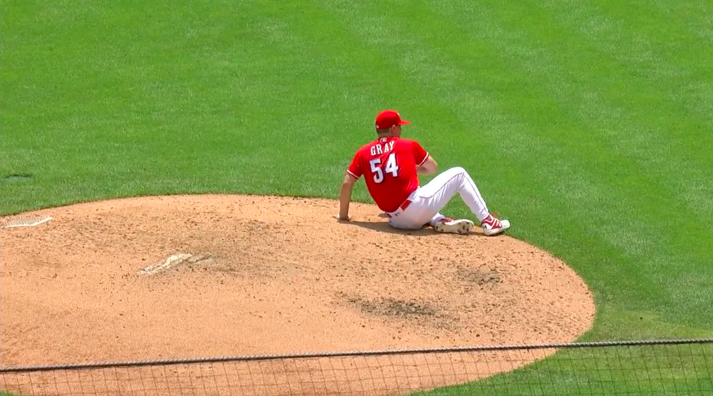 Reds pitcher Sonny Gray rubs his butt against the mound during Sunday's game.