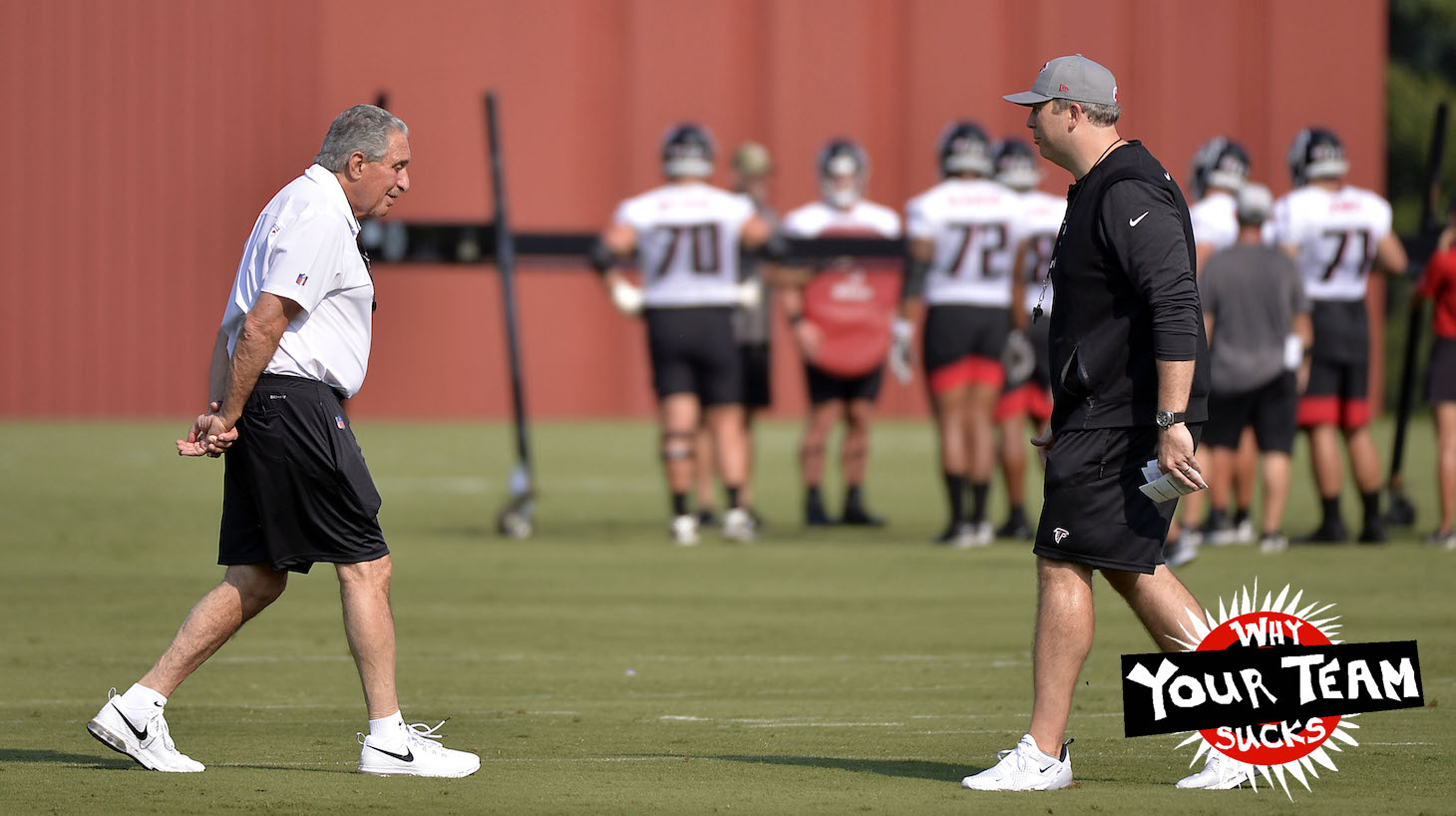 FLOWERY BRANCH, GA - JULY 29: Team owner Arthur Blank (l) of the Atlanta Falcons walks toward Head Coach Arthur Smith on the first day of training camp at IBM Performance Field on July 29, 2021 in Flowery Branch, Georgia. (Photo by Edward M. Pio Roda/Getty Images)
