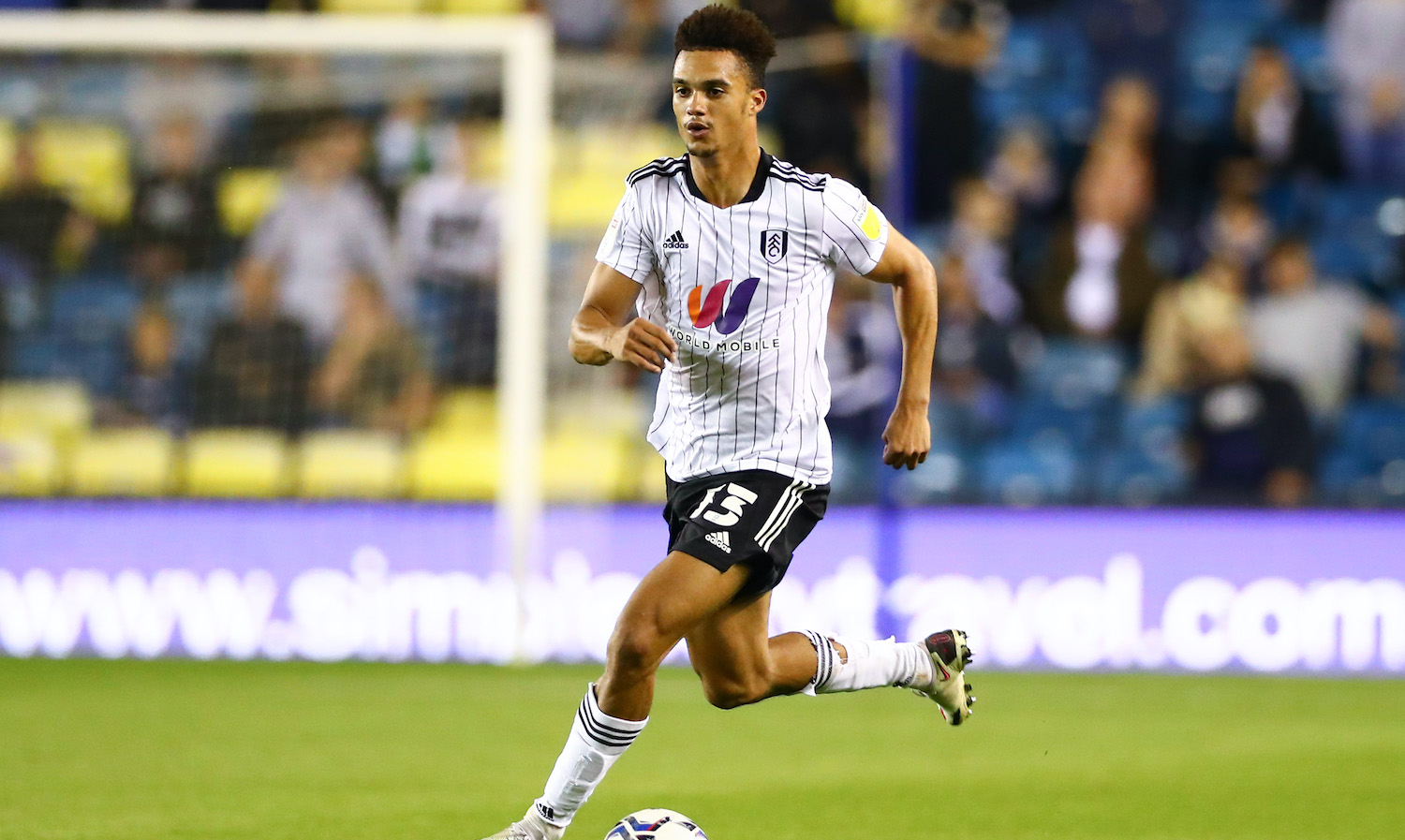 LONDON, ENGLAND - AUGUST 17: Antonee Robinson of Fulham runs with the ball during the Sky Bet Championship match between Millwall and Fulham at The Den on August 17, 2021 in London, England. (Photo by Jacques Feeney/Getty Images)