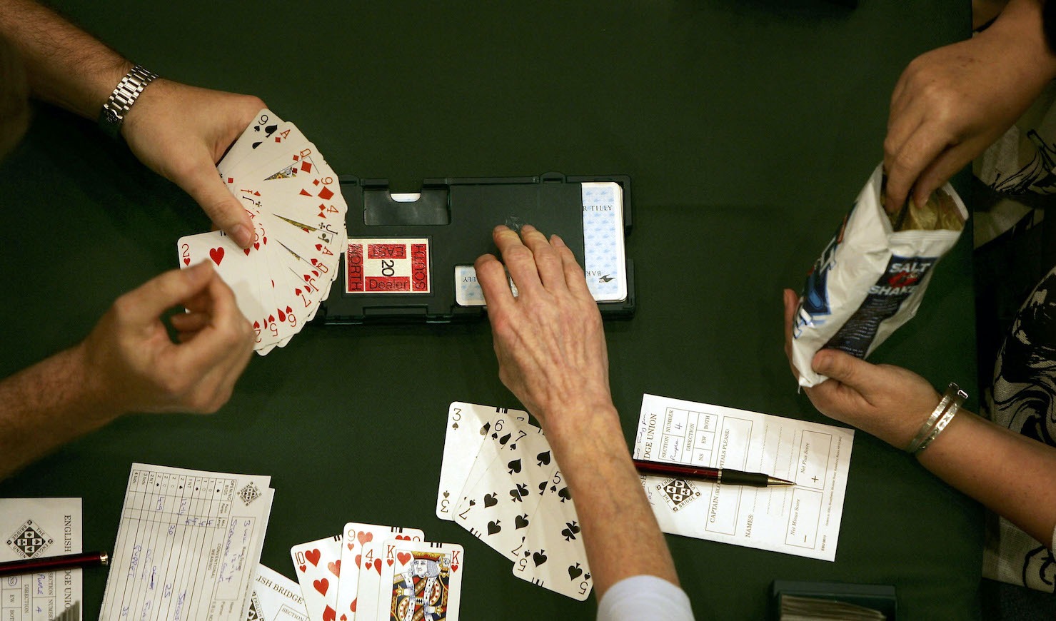 People play in an open round of Europe's biggest single venue bridge competition at the Metropole Hotel August 19, 2005 in Brighton, England. The game of Bridge is believed to share the same mental ability that is used to trade shares and is played regularly by over a million people. (Photo by Bruno Vincent/Getty Images)