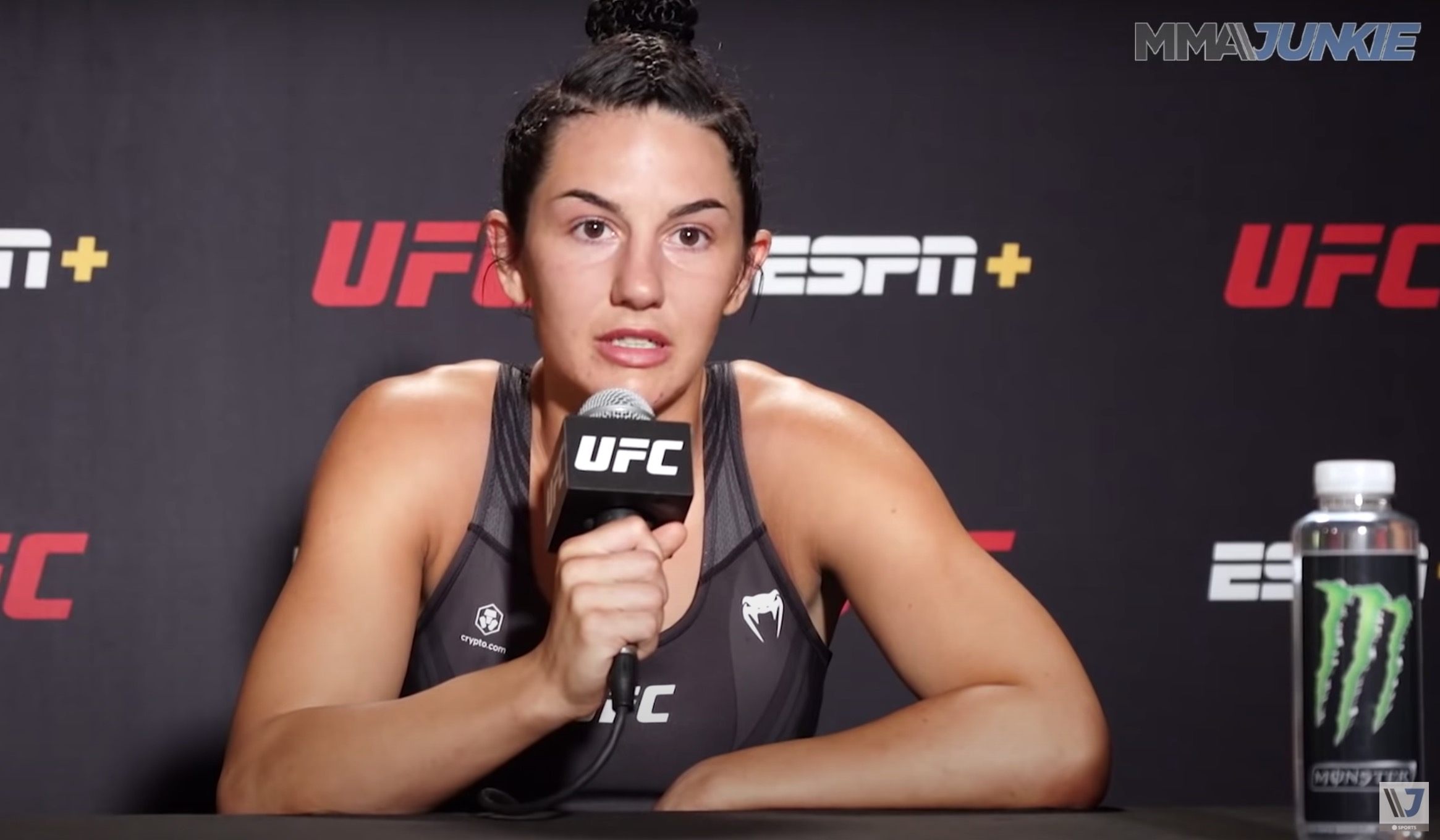 Buys giving her post-fight presser.