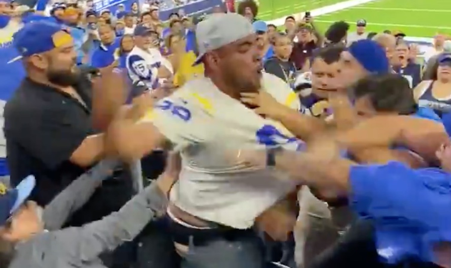 Rams-Chargers game features insane brawl between fans at SoFi