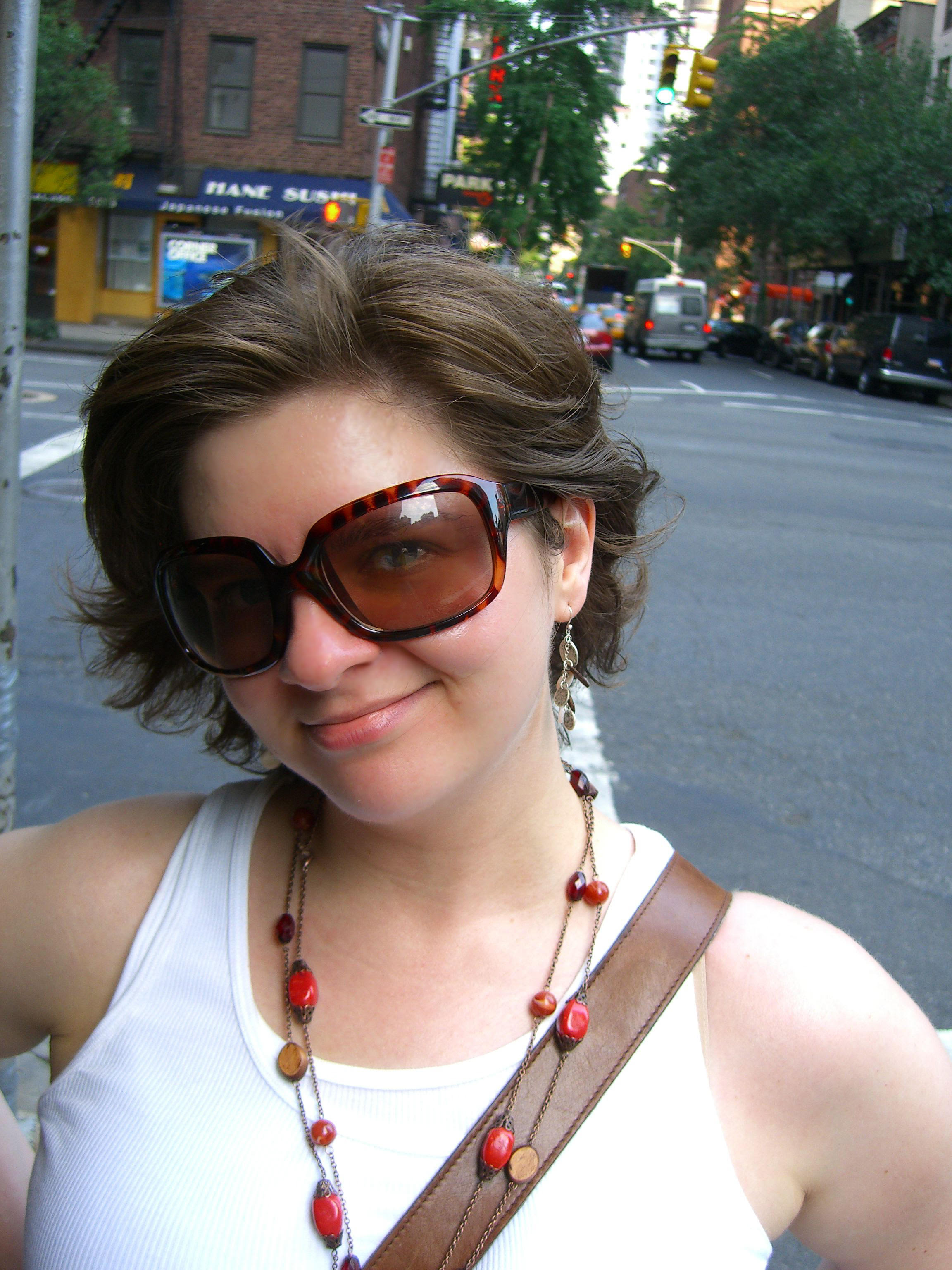 It's a photo of Tara Ariano. She has big sunglasses on.