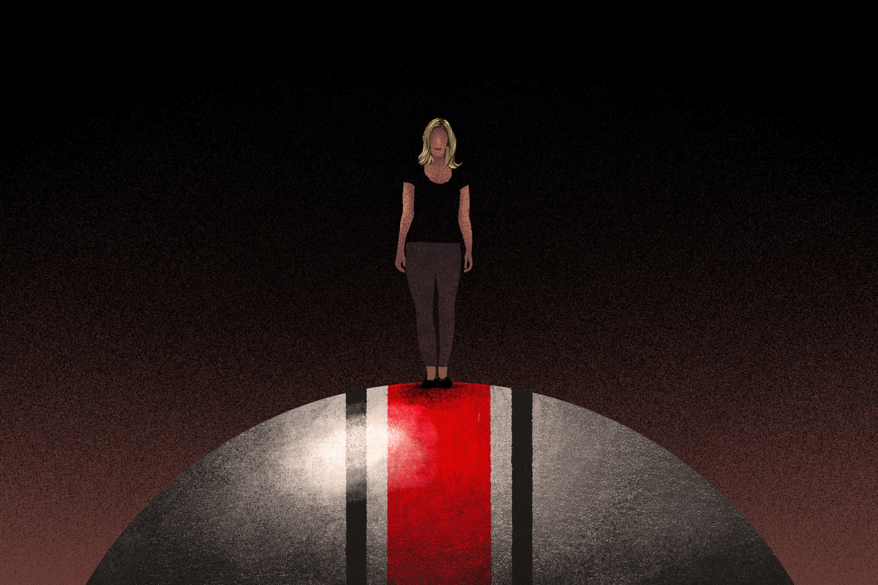 An image of a woman standing atop an Ohio State football helmet. She is very small, while the helmet fills the frame. Behind her is darkness.