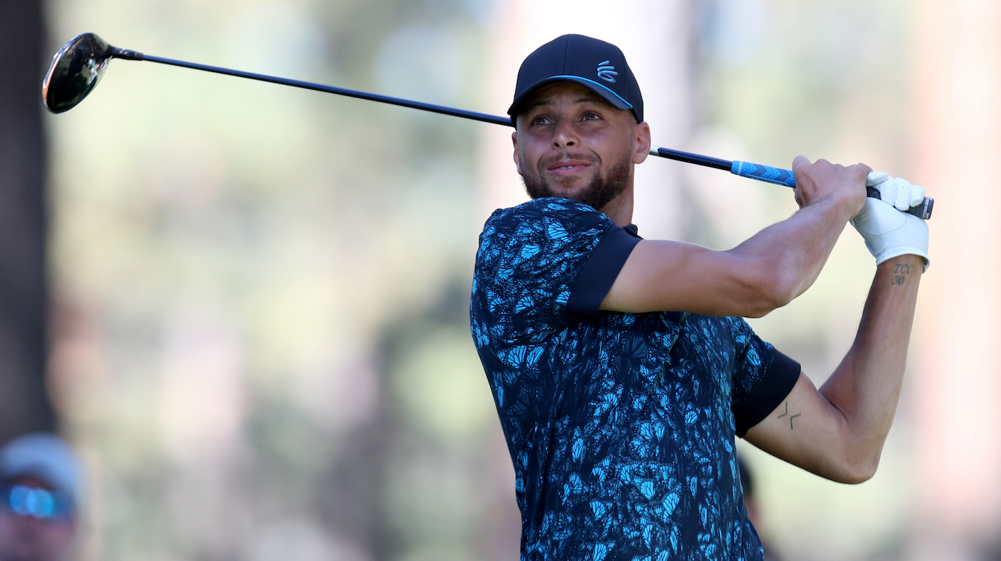 SOUTH LAKE TAHOE, NEVADA - JULY 11: NBA athlete Steph Curry tees off from the second hole during the final round of the American Century Championship at Edgewood Tahoe South golf course on July 11, 2020 in South Lake Tahoe, Nevada. (Photo by Jed Jacobsohn/Getty Images)