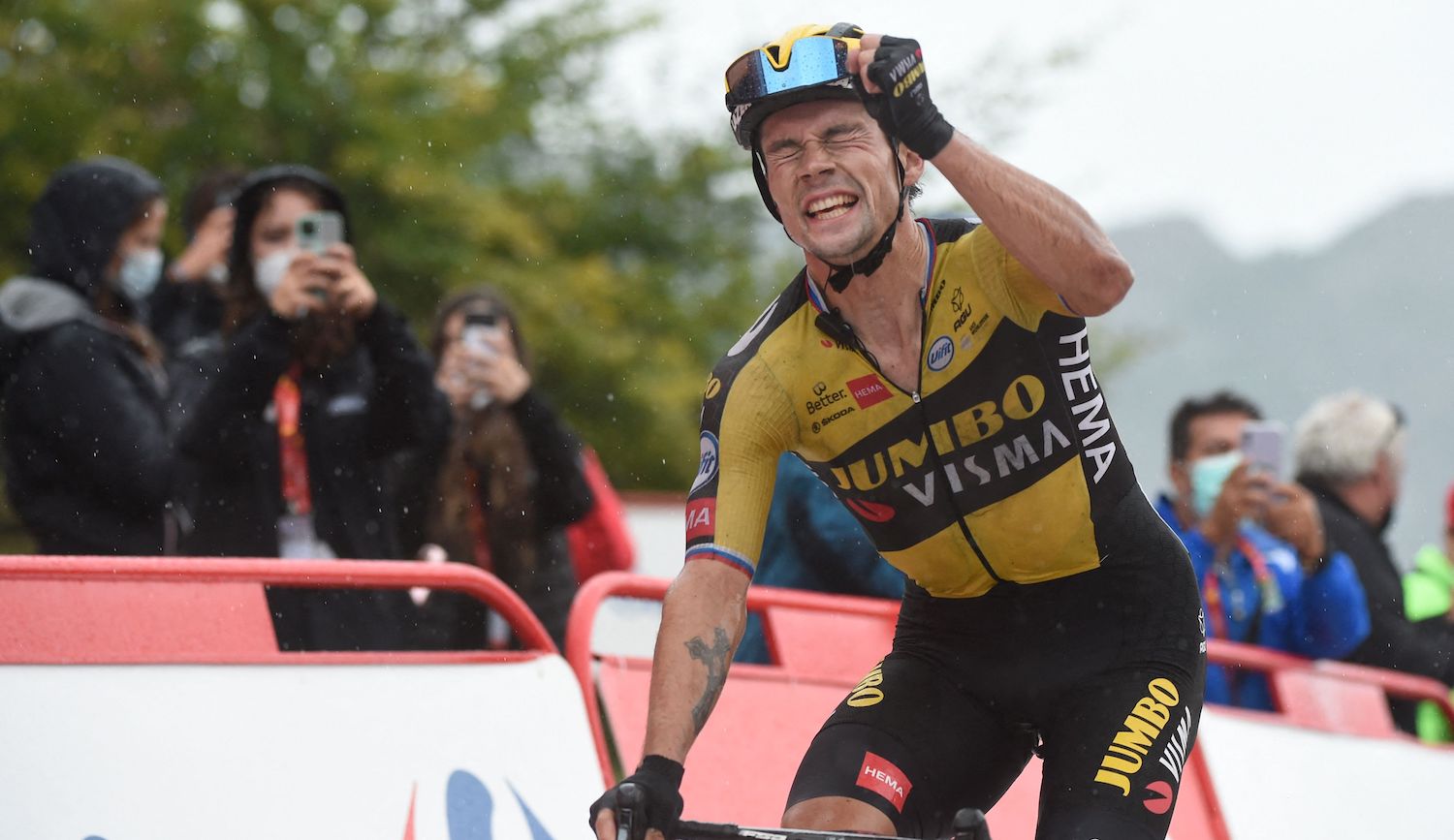 Team Jumbo's Slovenian rider Primoz Roglic celebrates as he wins the 17th stage of the 2021 La Vuelta cycling tour of Spain, a 185.8 km race from Unquera to Lagos de Covadonga on September 1, 2021. (Photo by MIGUEL RIOPA / AFP) (Photo by MIGUEL RIOPA/AFP via Getty Images)