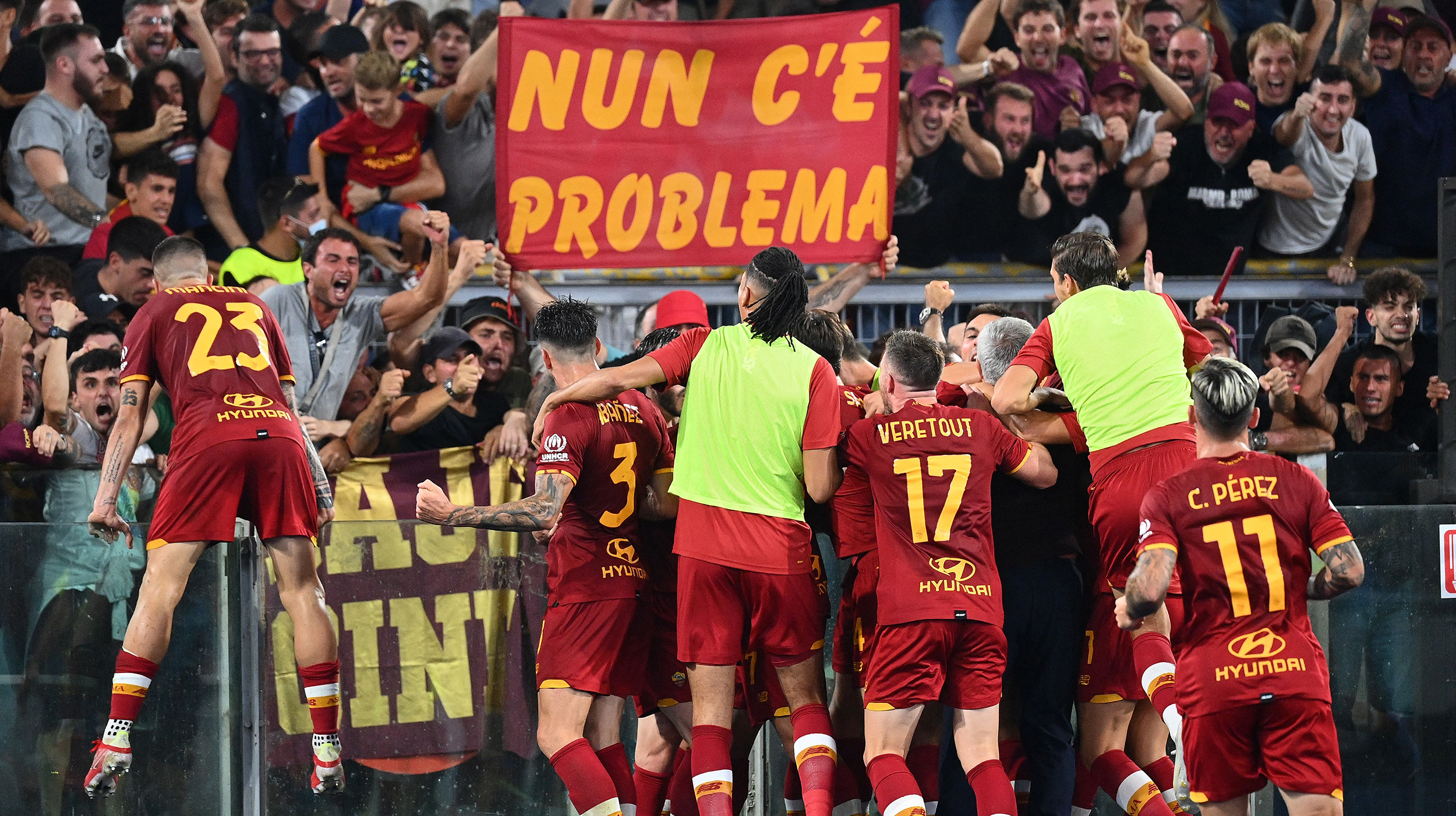 Roma's players celebrate after scoring during the Italian Serie A football match between AS Roma and Sassuolo at the Olympic stadium in Rome on September 12, 2021.
