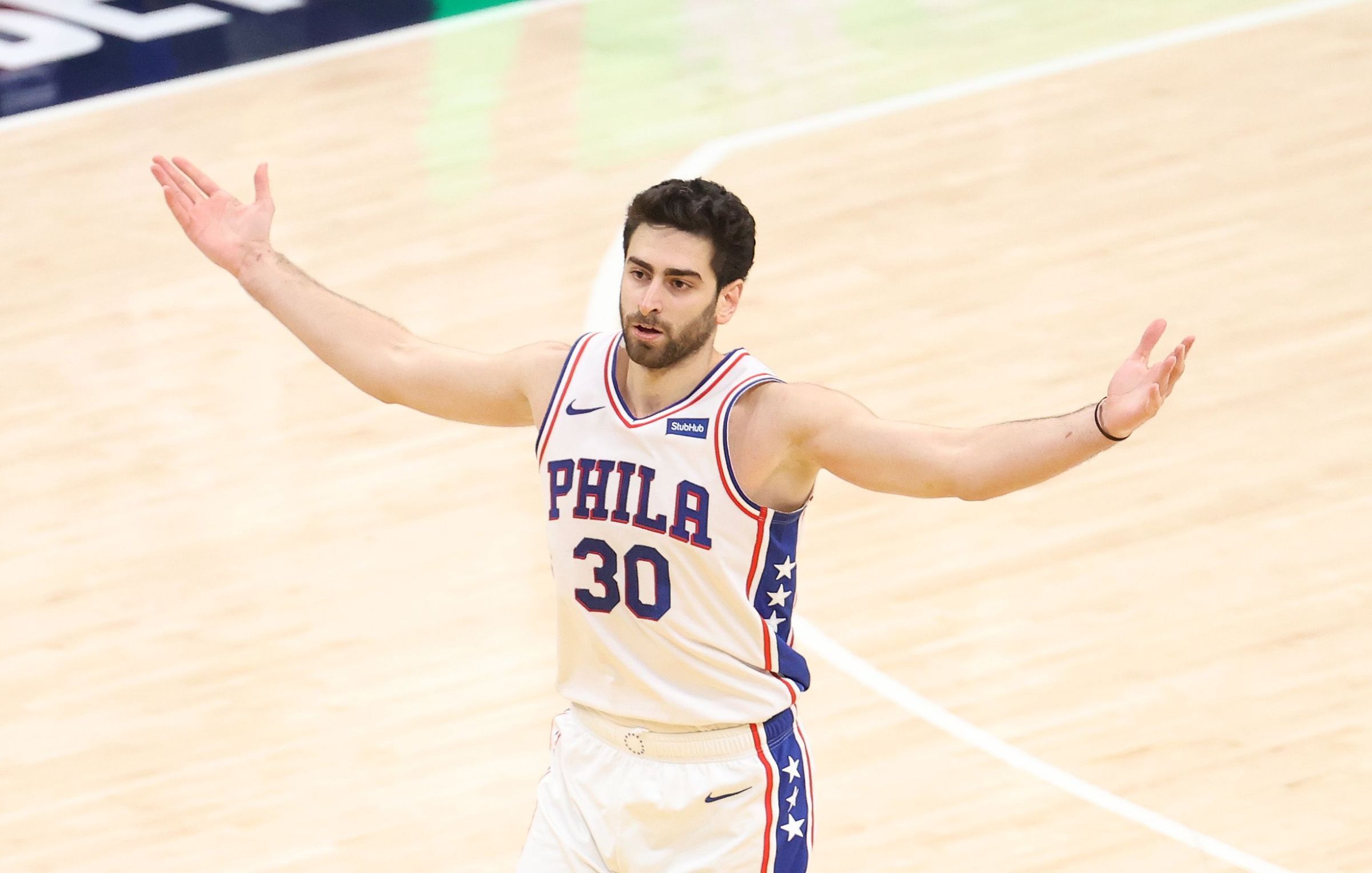 Furkan Korkmaz #30 of the Philadelphia 76ers celebrates in the game against the Indiana Pacers at Bankers Life Fieldhouse on January 31, 2021 in Indianapolis, Indiana.