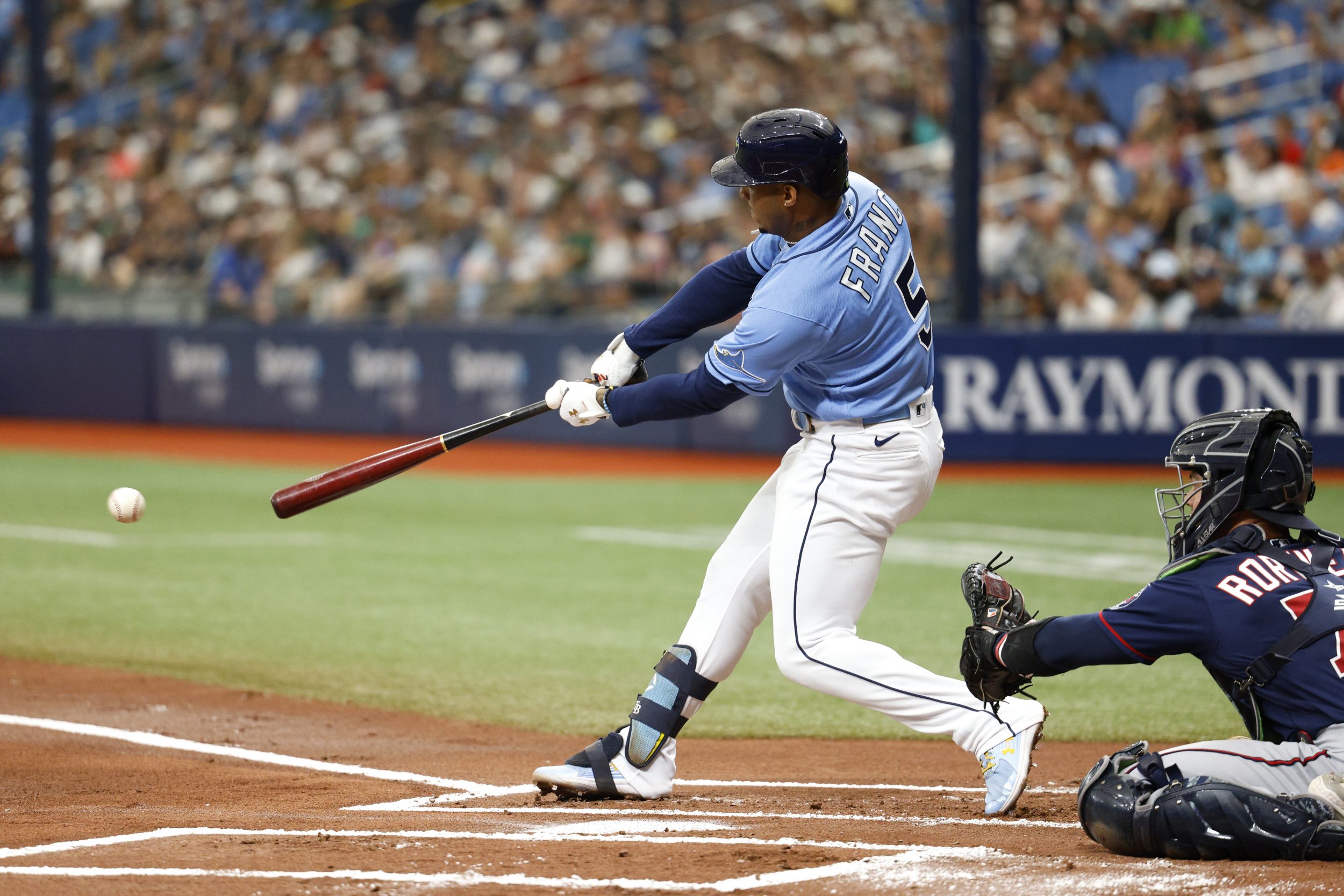 Wander Franco smites a puny baseball.
