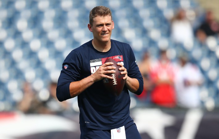 Mac Jones #10 of the New England Patriots warms up prior to the game against the Miami Dolphins at Gillette Stadium on September 12, 2021 in Foxborough, Massachusetts.