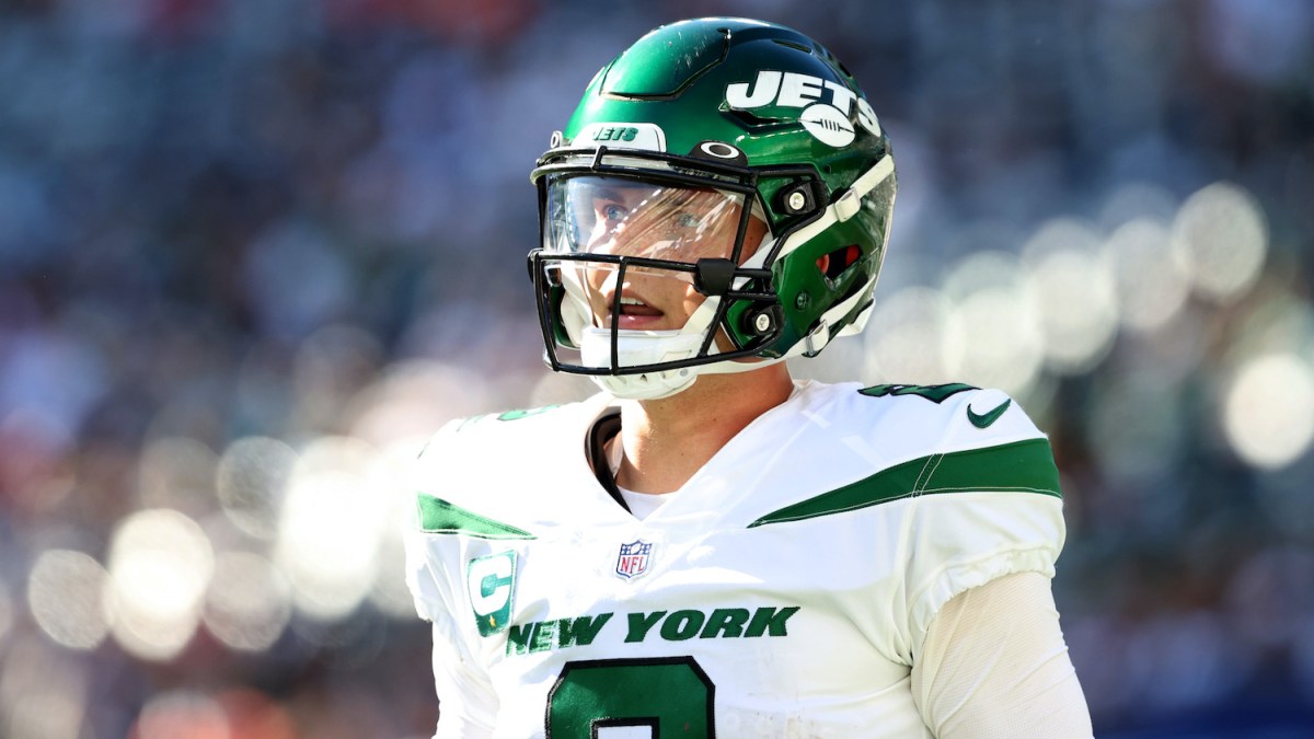 EAST RUTHERFORD, NEW JERSEY - SEPTEMBER 19: Quarterback Zach Wilson #2 of the New York Jets looks on during the fourth quarter against the New England Patriots at MetLife Stadium on September 19, 2021 in East Rutherford, New Jersey. (Photo by Elsa/Getty Images)