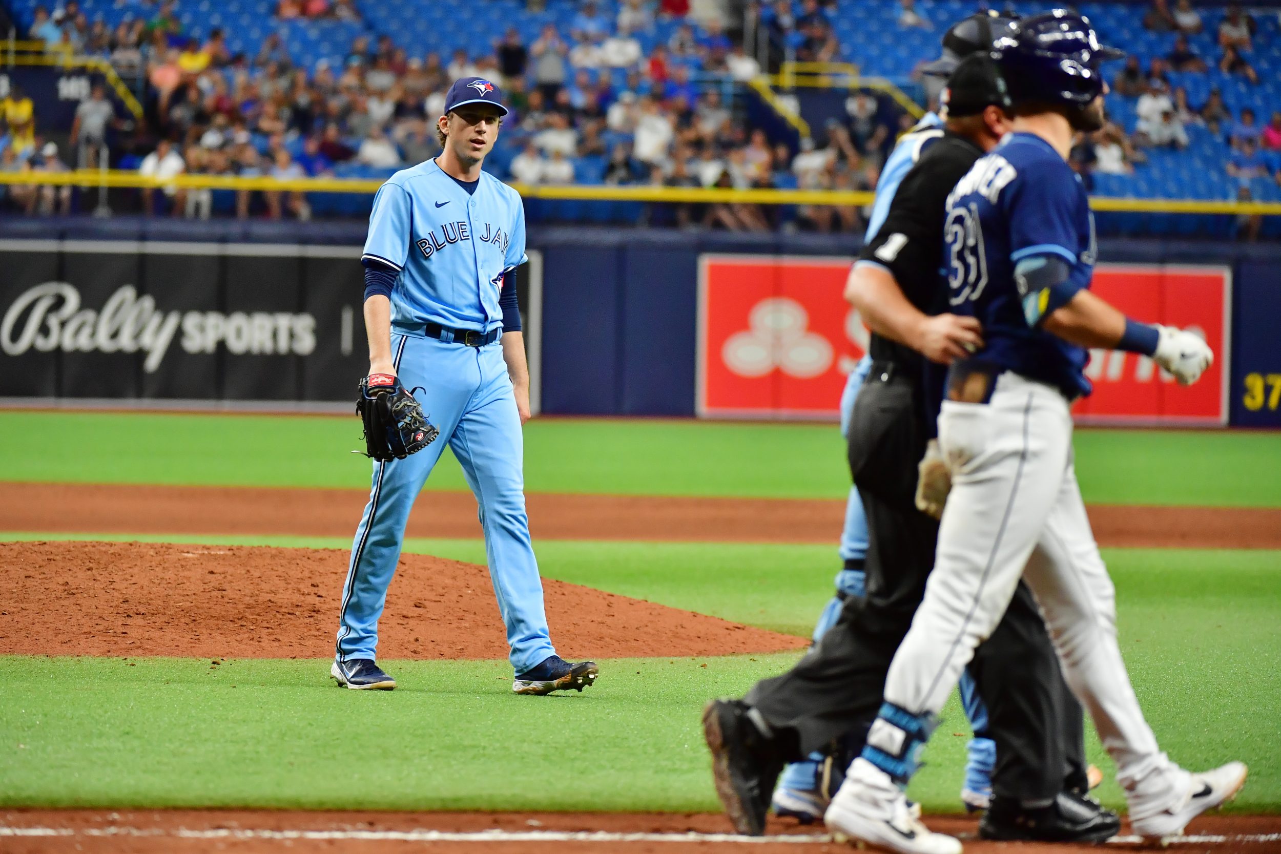 Ryan Borucki chirps at Kevin Kiermaier after plunking him in the back.
