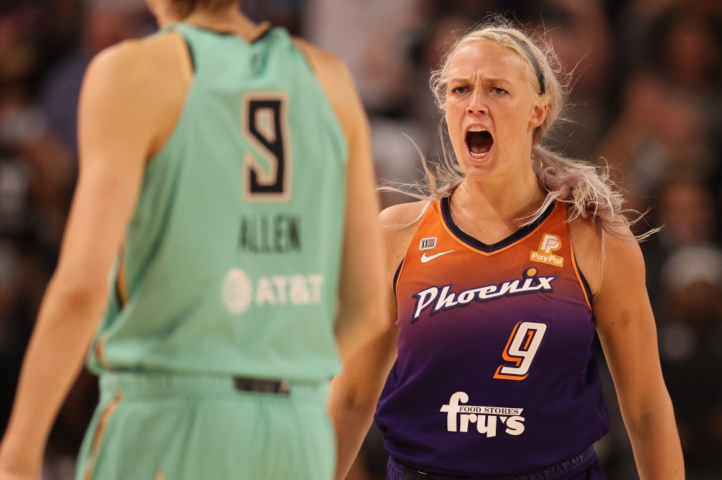 Sophie Cunningham #9 of the Phoenix Mercury reacts after hitting a three-point shot over Rebecca Allen #9 of the New York Liberty during the second half of the first round WNBA playoffs at Grand Canyon University Arena on September 23, 2021 in Phoenix, Arizona. The Mercury defeated the Liberty 83-82.