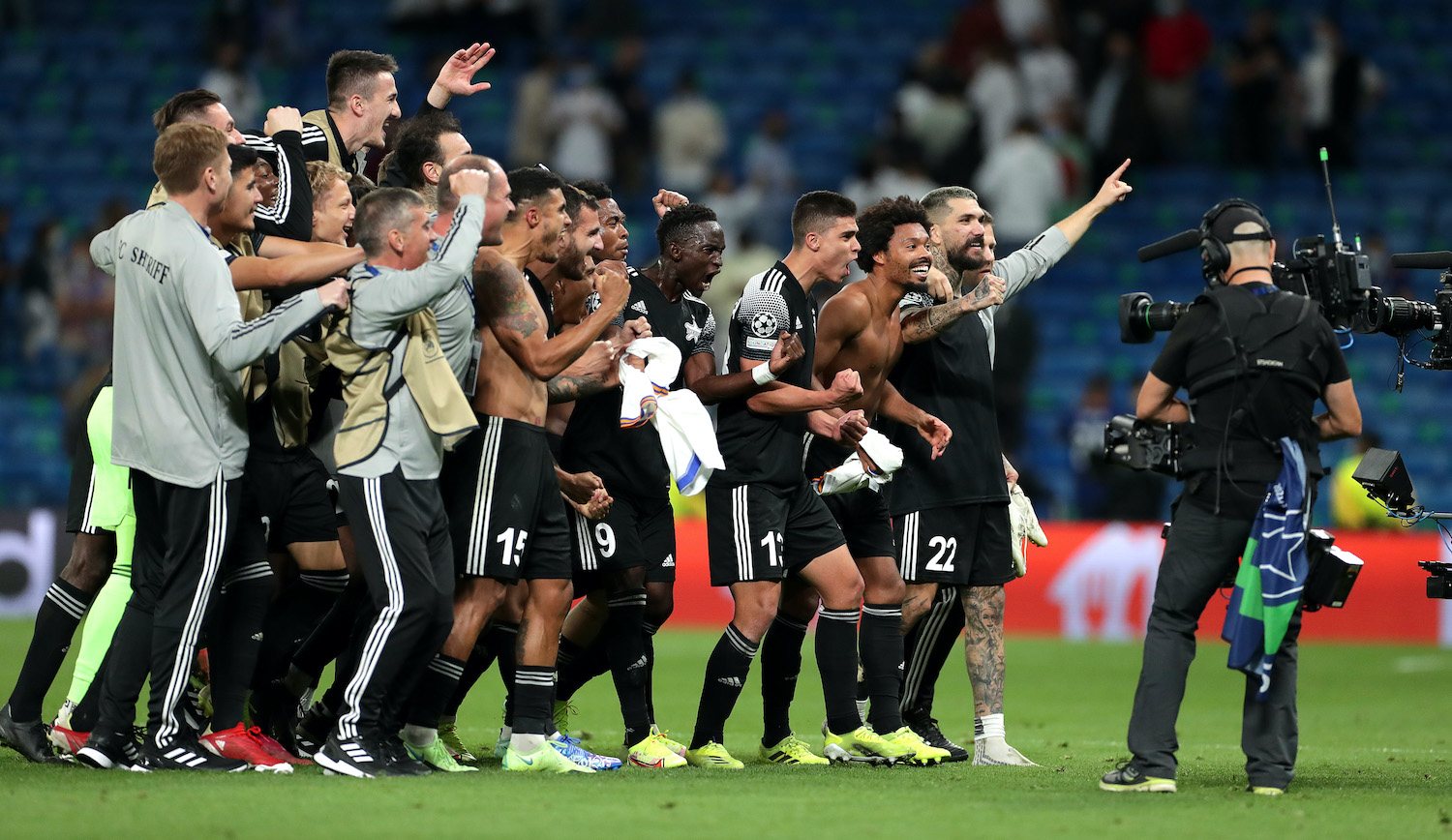 MADRID, SPAIN - SEPTEMBER 28: Players of FC Sheriff celebrate after victory in the UEFA Champions League group D match between Real Madrid and FC Sheriff at Estadio Santiago Bernabeu on September 28, 2021 in Madrid, Spain. (Photo by Gonzalo Arroyo Moreno/Getty Images)