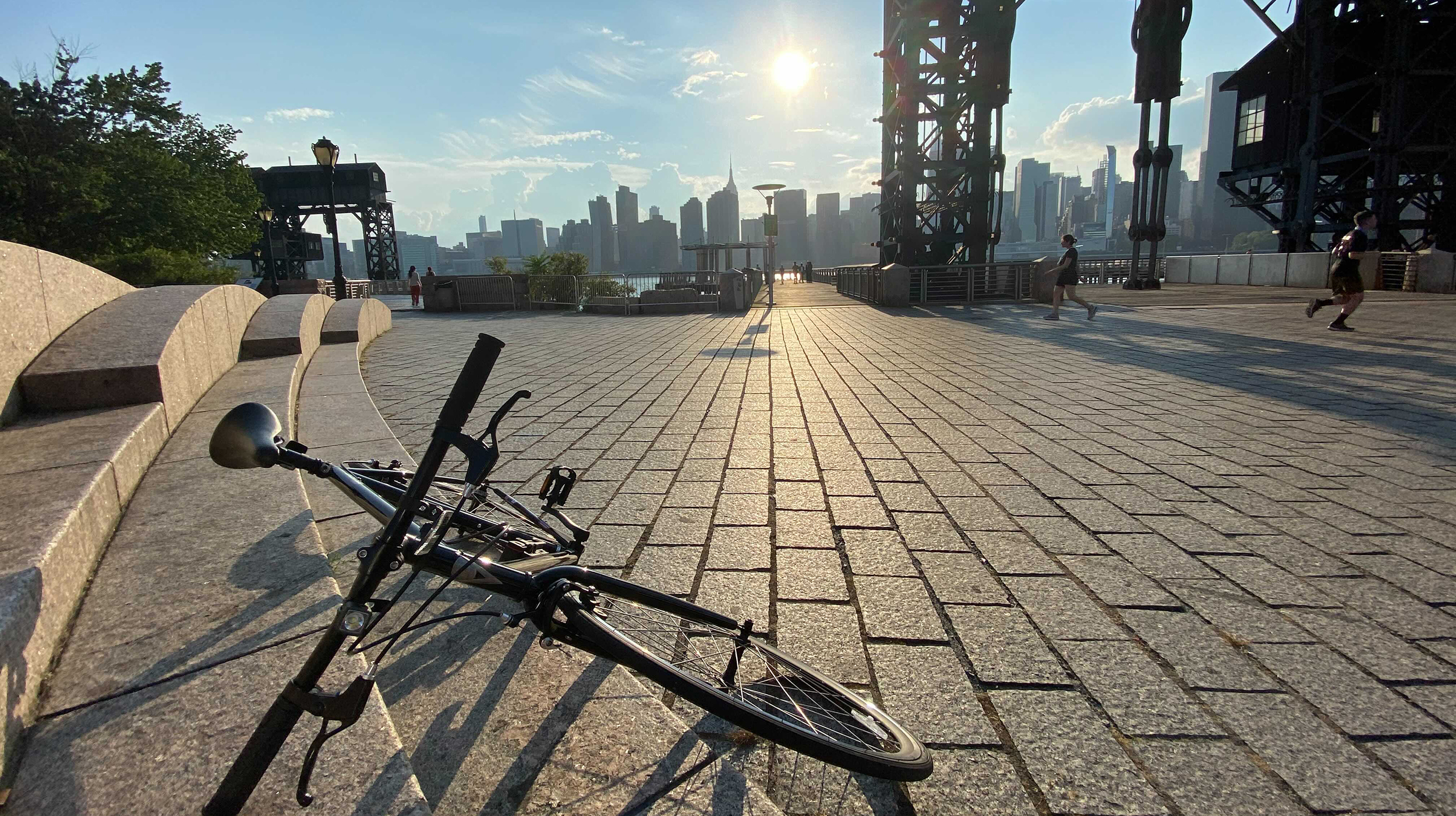 A bike rests by the waterfront in Queens, New York