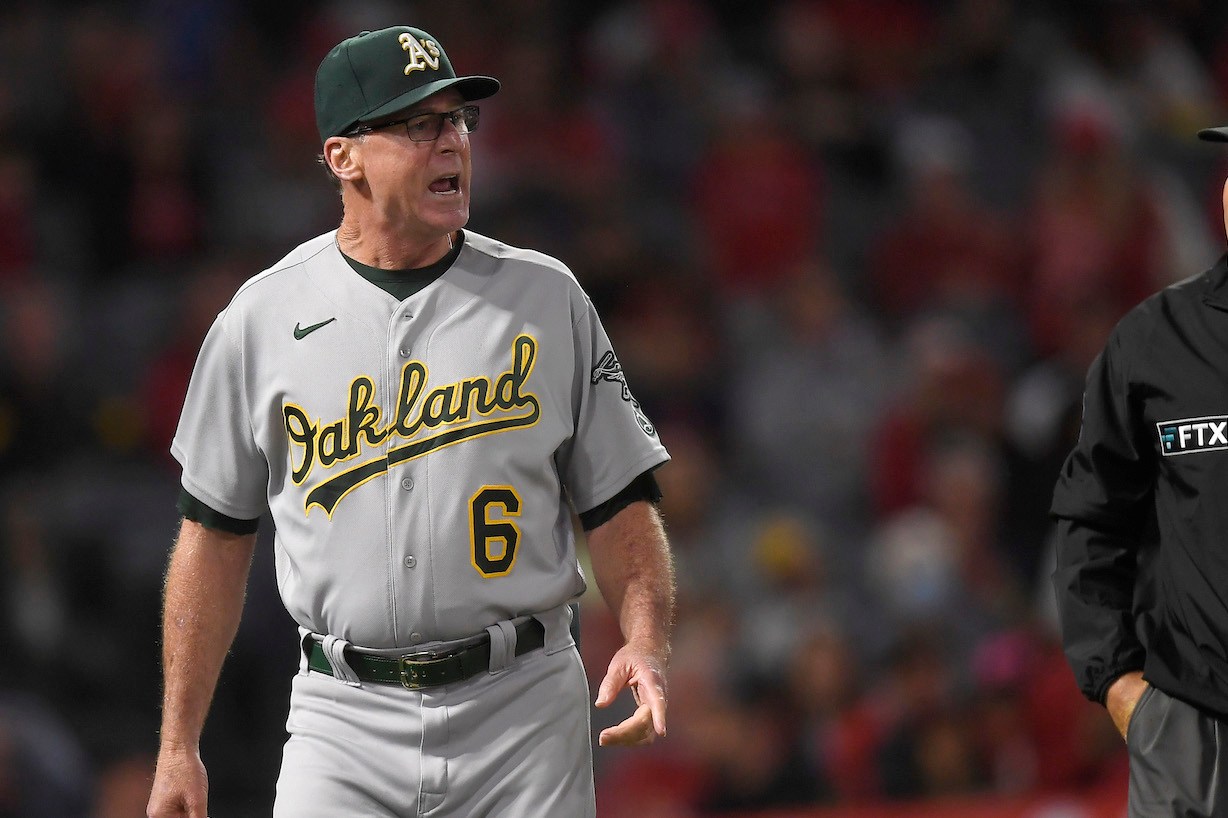 ANAHEIM, CA - SEPTEMBER 18: Manager Bob Melvin #6 of the Oakland Athletics argues with umpire Mark Carlson #6 after a call was reversed during the seventh inning against Los Angeles Angels at Angel Stadium of Anaheim on September 18, 2021 in Anaheim, California. (Photo by Kevork Djansezian/Getty Images)