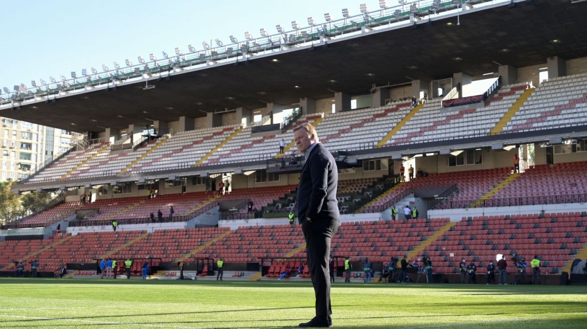 Barcelona's Dutch coach Ronald Koeman stands on the pitch before the start of the Spanish League football match between Rayo Vallecano de Madrid and FC Barcelona at the Vallecas stadium in Madrid on October 27, 2021.