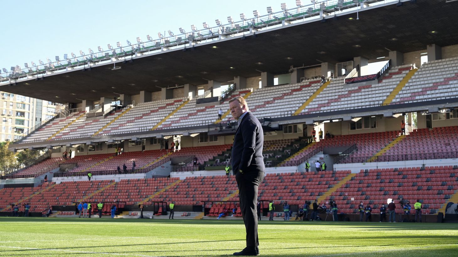 Barcelona's Dutch coach Ronald Koeman stands on the pitch before the start of the Spanish League football match between Rayo Vallecano de Madrid and FC Barcelona at the Vallecas stadium in Madrid on October 27, 2021.