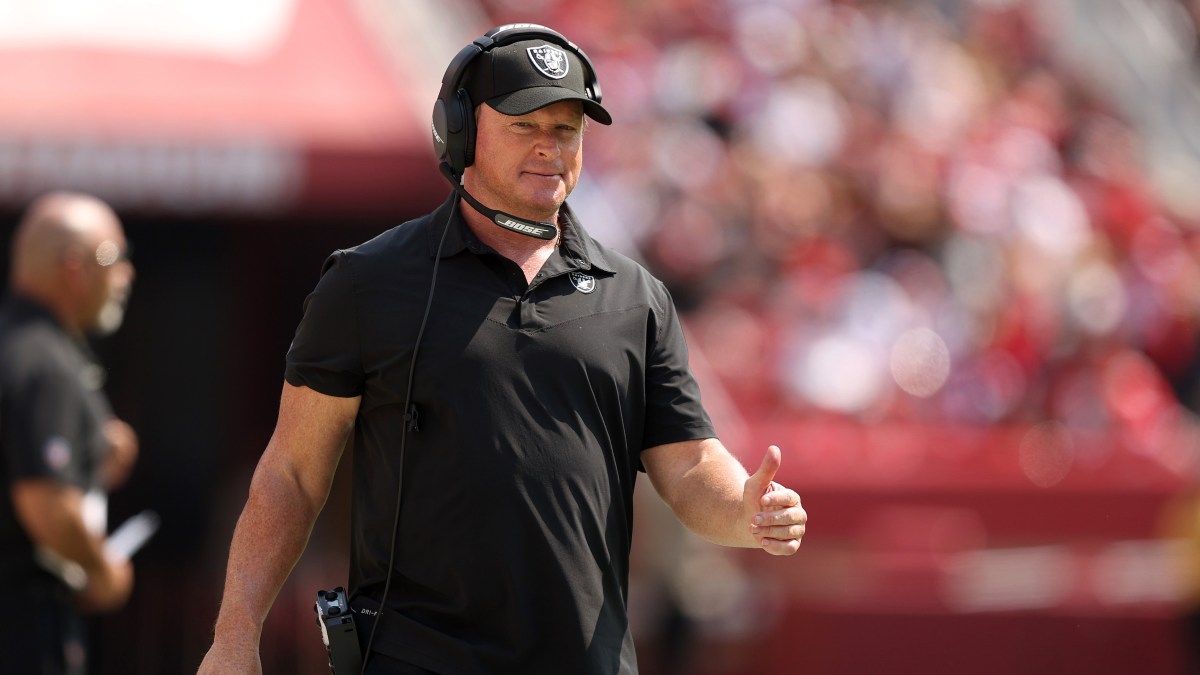 Jon Gruden gives the thumbs-up to sometimes wearing glasses and sometimes not.
