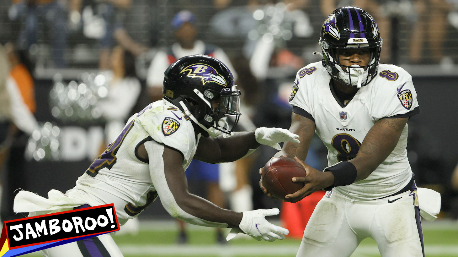 LAS VEGAS, NEVADA - SEPTEMBER 13: Lamar Jackson #8 of the Baltimore Ravens fakes a handoff to running back Ty'Son Williams #34 against the Las Vegas Raiders at Allegiant Stadium on September 13, 2021 in Las Vegas, Nevada. The Raiders defeated the Ravens 33-27 in overtime. (Photo by Ethan Miller/Getty Images)
