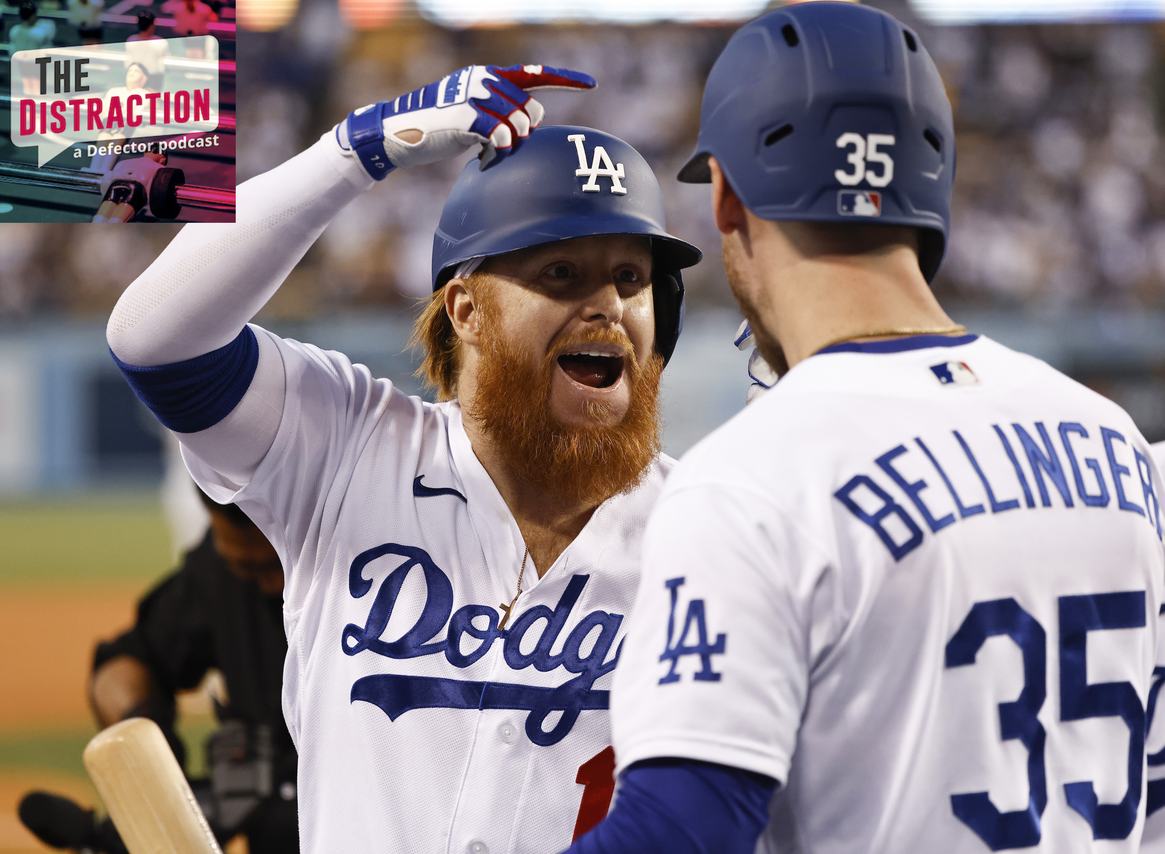 Justin Turner and Cody Bellinger celebrate in a Dodger win.