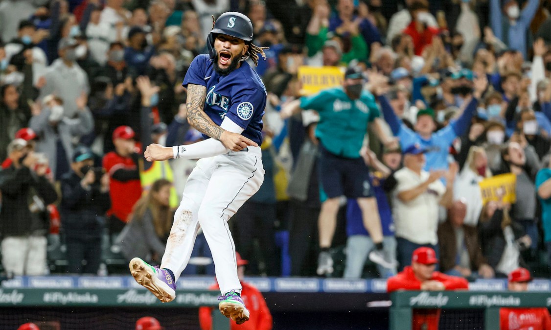 SEATTLE, WASHINGTON - OCTOBER 02: J.P. Crawford #3 of the Seattle Mariners reacts after scoring on a single by Mitch Haniger #17 during the eighth inning against the Los Angeles Angels at T-Mobile Park on October 02, 2021 in Seattle, Washington. (Photo by Steph Chambers/Getty Images)
