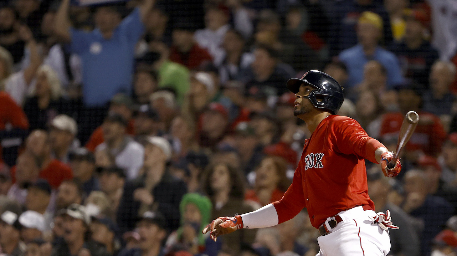 BOSTON, MASSACHUSETTS - OCTOBER 05: Xander Bogaerts #2 of the Boston Red Sox watches his two run home run against the New York Yankees during the first inning of the American League Wild Card game at Fenway Park on October 05, 2021 in Boston, Massachusetts. (Photo by Winslow Townson/Getty Images)