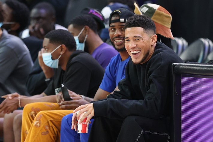 Chirs Paul and Devin Booker of the Phoenix Suns, at Game 4 of the WNBA semifinals