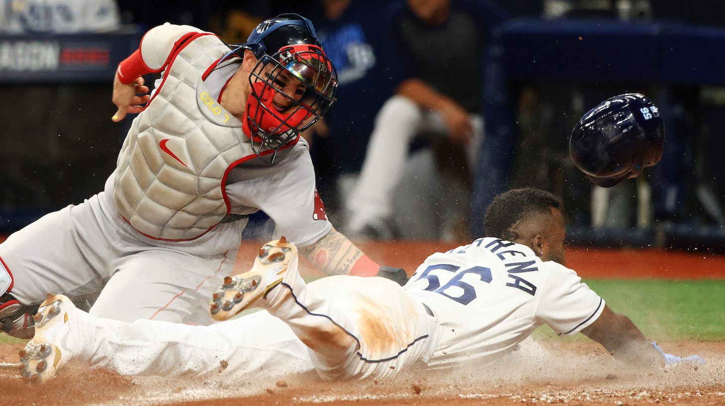 ST PETERSBURG, FLORIDA - OCTOBER 07: Randy Arozarena #56 of the Tampa Bay Rays steals home against Christian Vazquez #7 of the Boston Red Sox in the seventh inning during Game 1 of the American League Division Series at Tropicana Field on October 07, 2021 in St Petersburg, Florida. (Photo by Mike Ehrmann/Getty Images)