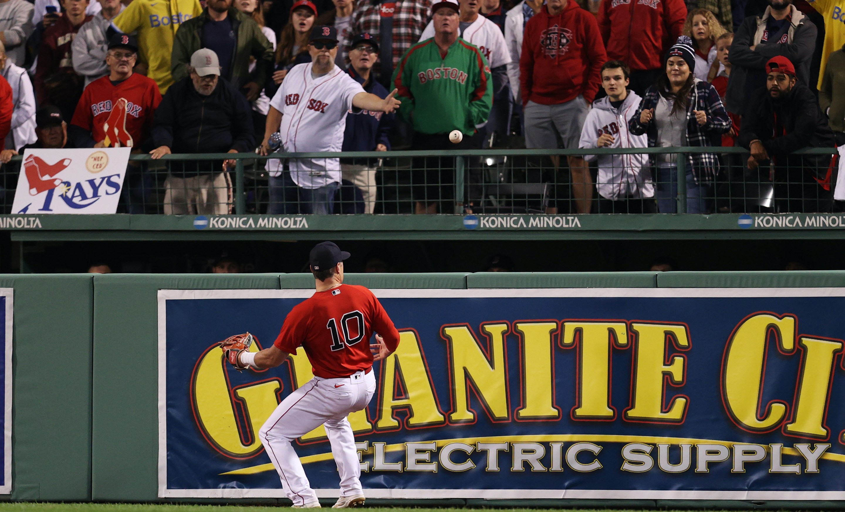 Hunter Renfroe kicks a ball over the wall at Fenway.