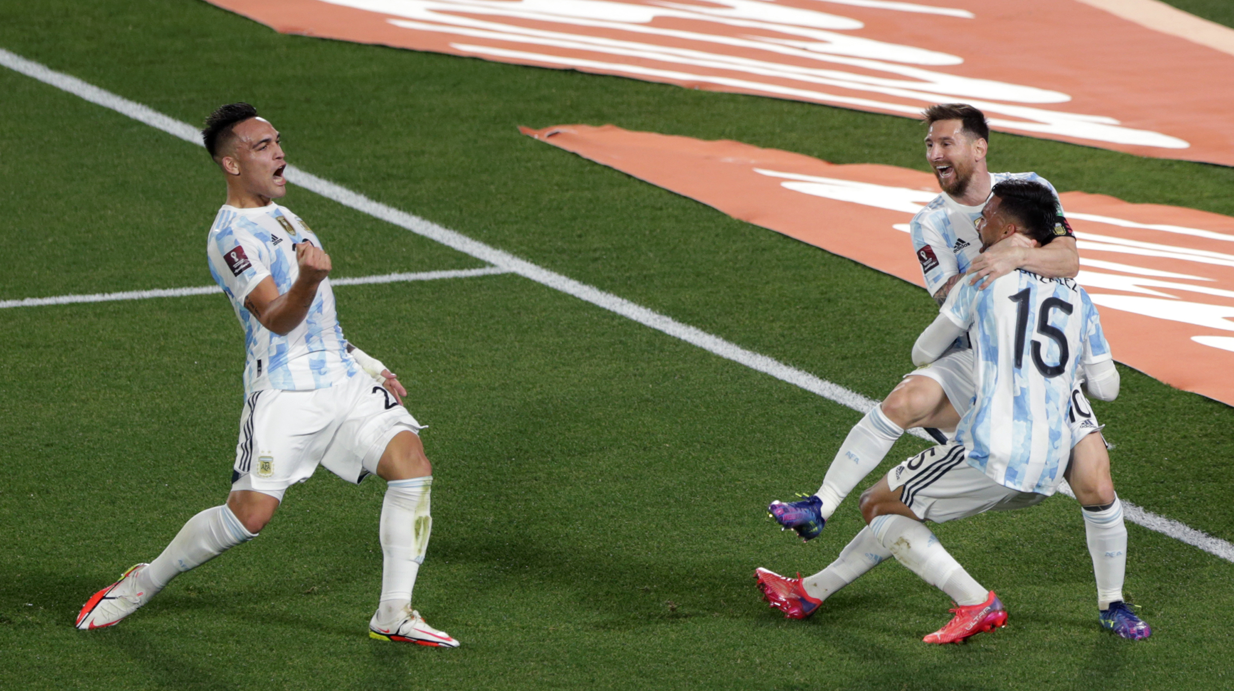 Lionel Messi of Argentina celebrates with teammate Nicolás Gonzalez after scoring the first goal of his team during a match between Argentina and Uruguay as part of South American Qualifiers for Qatar 2022 at Estadio Monumental Antonio Vespucio Liberti on October 10, 2021 in Buenos Aires, Argentina.