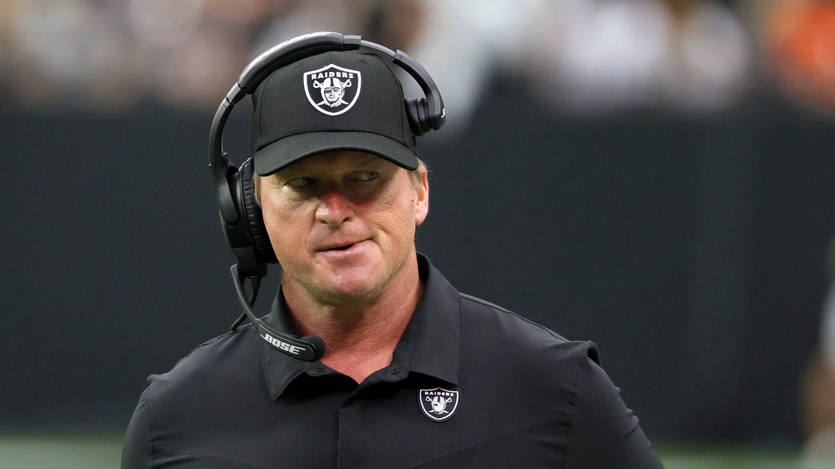 Then-head coach Jon Gruden of the Las Vegas Raiders reacts during a game against the Chicago Bears at Allegiant Stadium on October 10, 2021 in Las Vegas, Nevada.