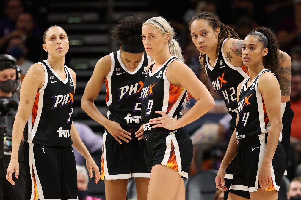 (L-R) Diana Taurasi #3, Brianna Turner #21, Sophie Cunningham #9, Brittney Griner #42 and Skylar Diggins-Smith #4 of the Phoenix Mercury stand on the court during the second half in Game Two of the 2021 WNBA Finals against the Chicago Sky at Footprint Center on October 13, 2021 in Phoenix, Arizona. The Mercury defeated the Sky 91-86 in overtime.