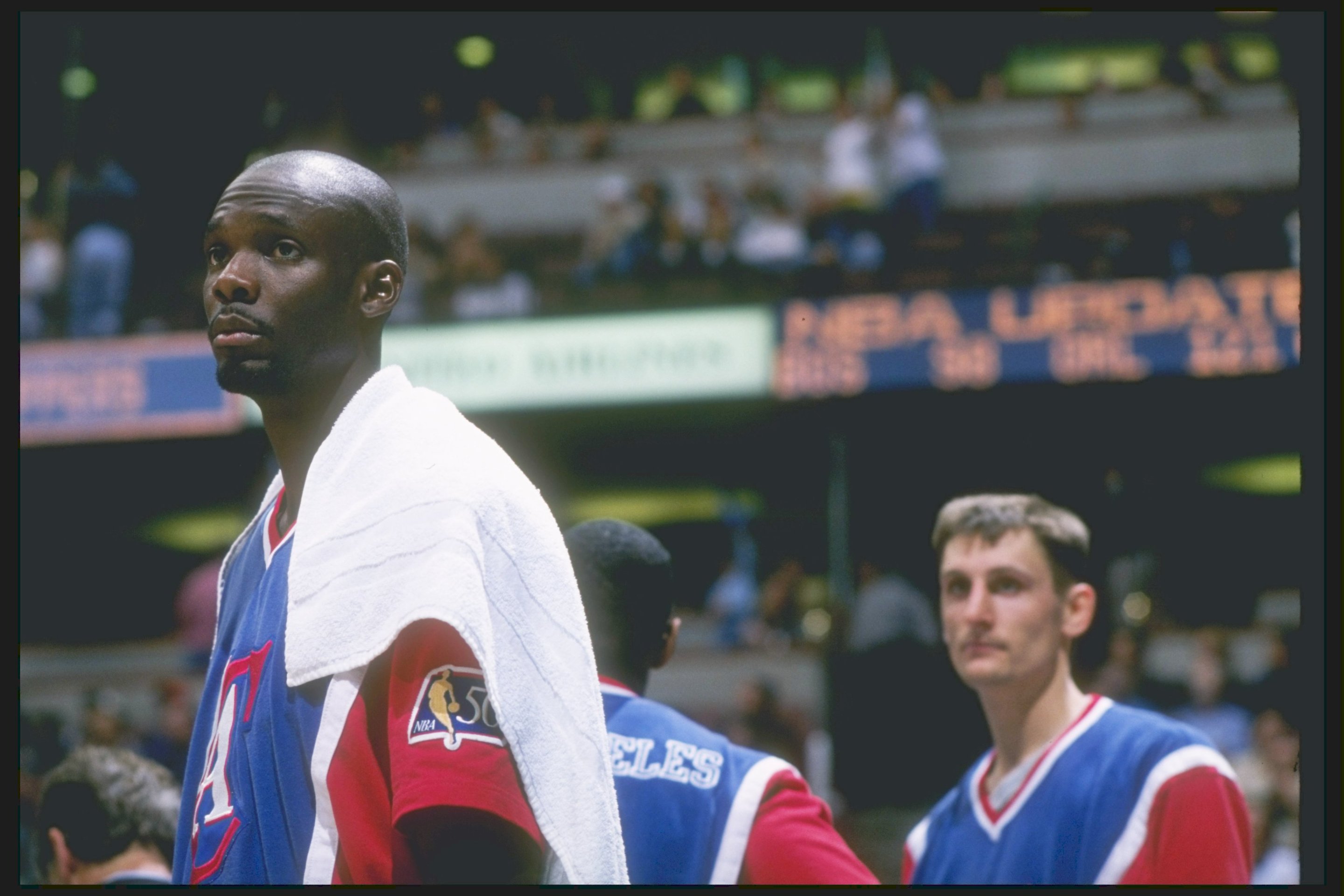 The late Malik Sealy and Brent Barry at a Los Angeles Clippers game in the Arrowhead Pond, in 1997.