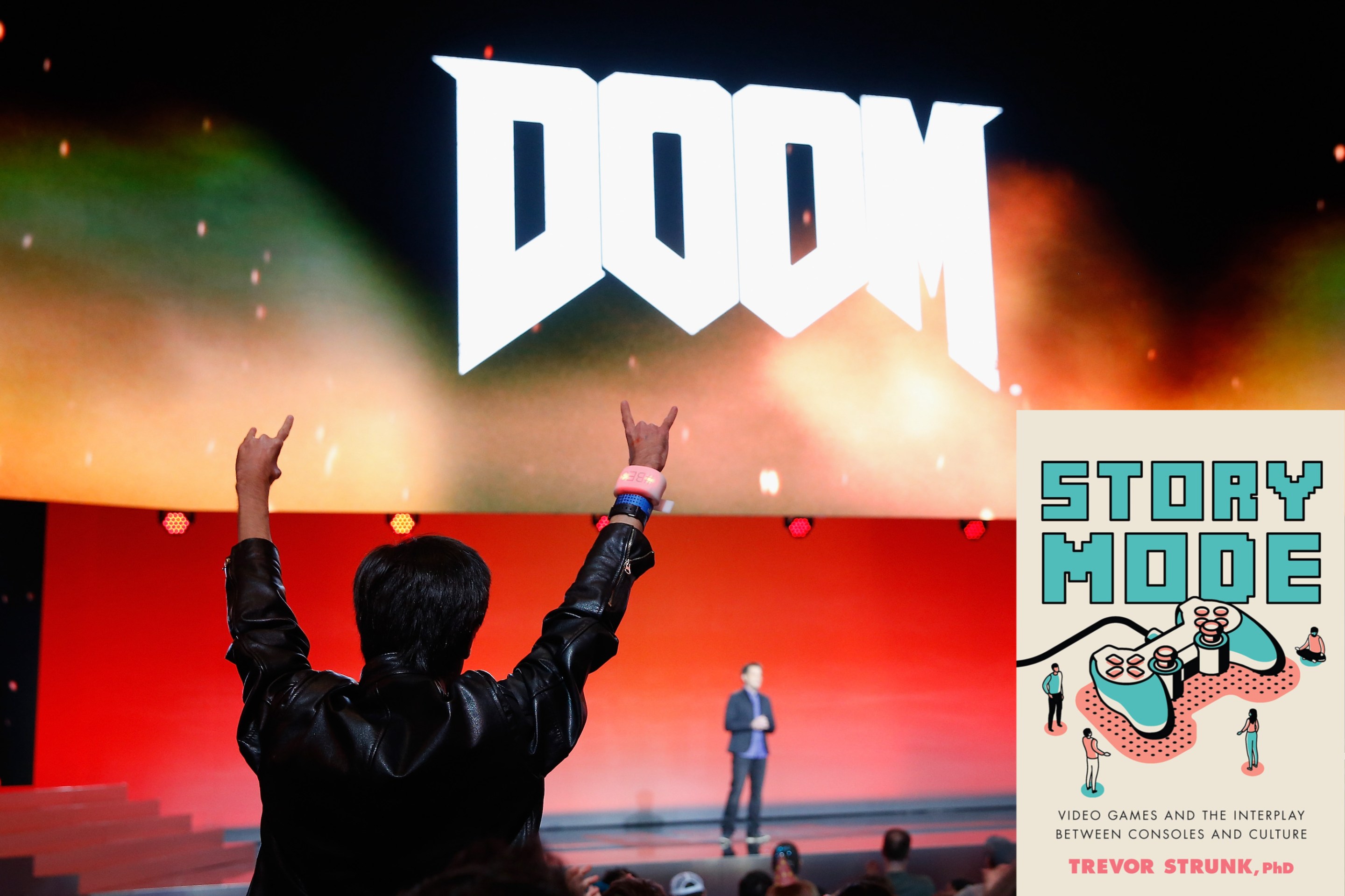 A fan cheers for id Software executive producer as he speaks about DOOM. The cover of Trevor Strunk's book, Story Mode, is in the lower right corner.