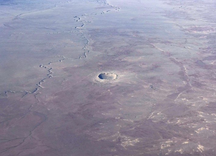 An impact crater in the remote desert.