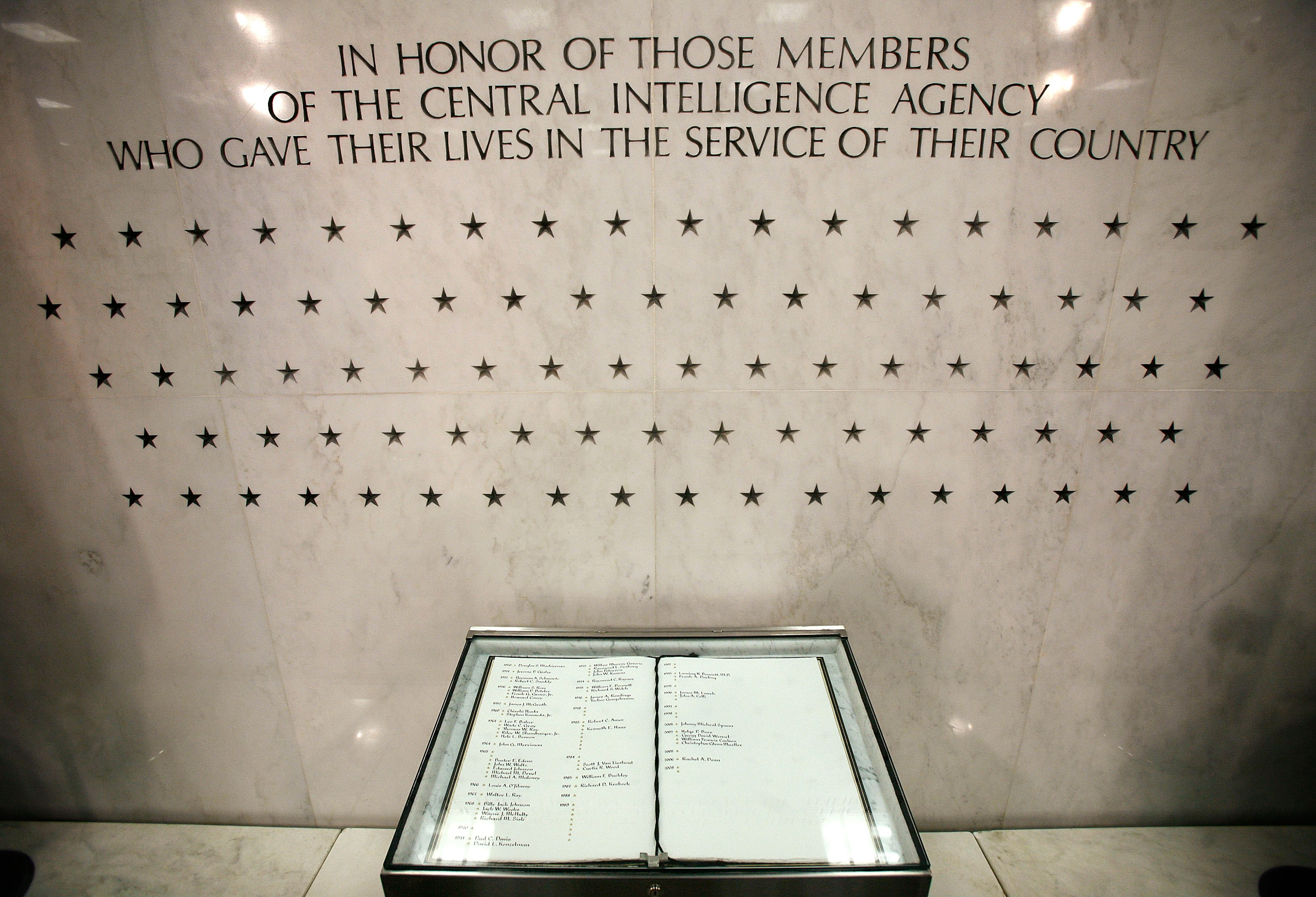 MCLEAN, VA - FEBRUARY 19: The Memorial Wall and the "Book of Honor" are seen in the lobby of the Original Headquarters Building at the Central Intelligence Agency headquarters February 19, 2009 in McLean, Virginia. The stars on the wall represent the number of CIA officers who have lost their lives for the country. (Photo by Alex Wong/Getty Images)
