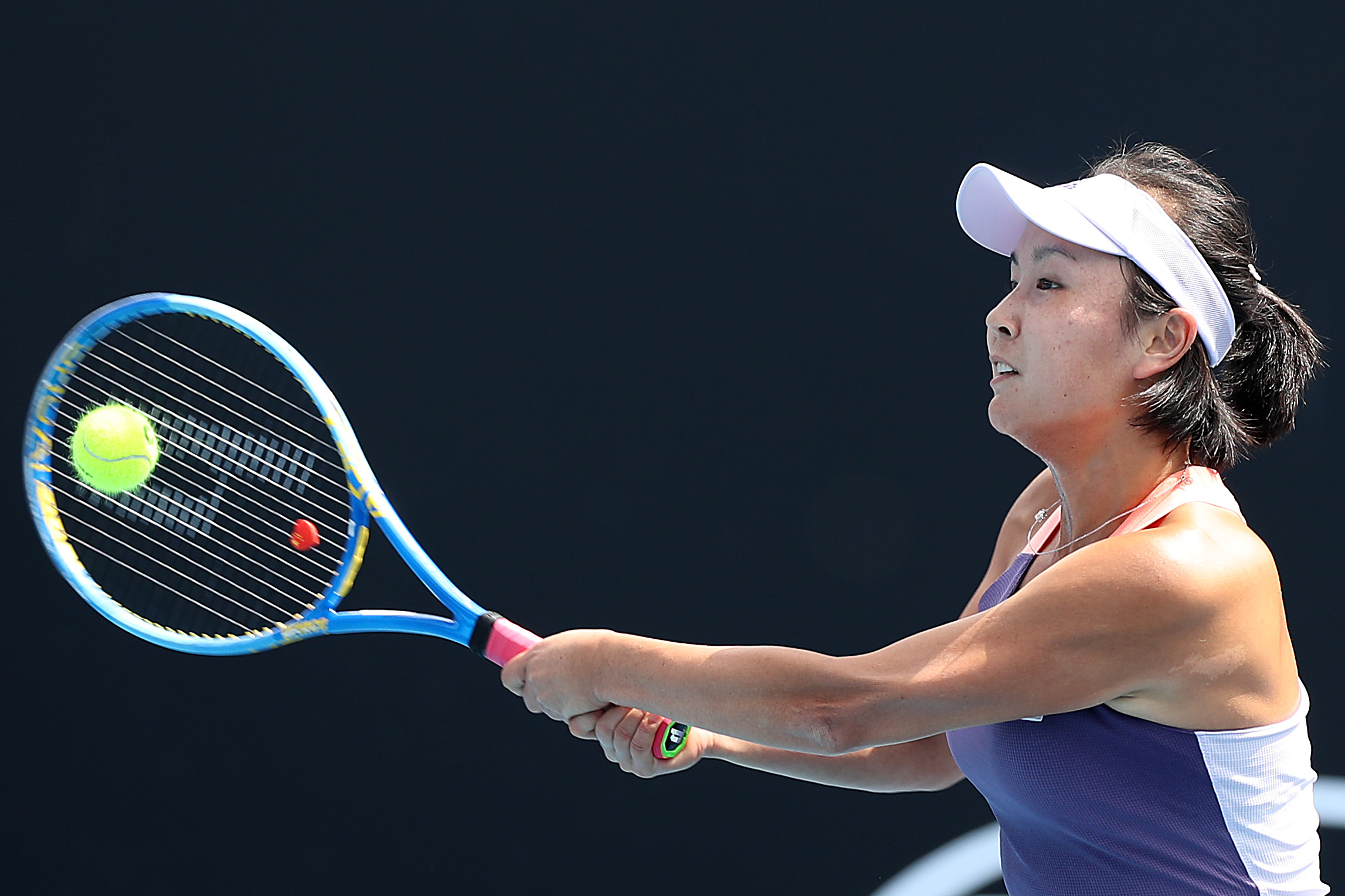 Peng Shuai hits a shot at the 2020 Australian Open.