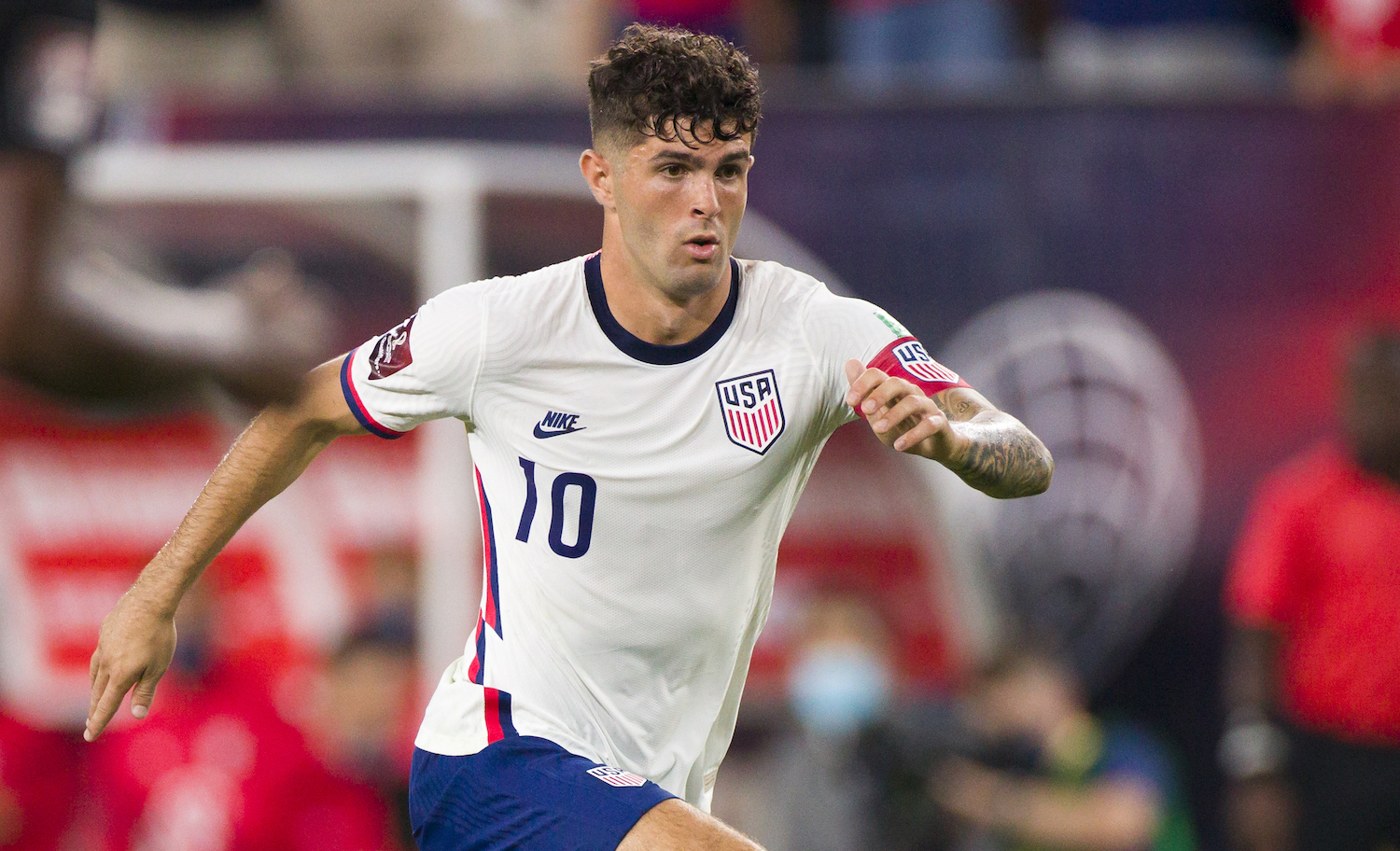 NASHVILLE, TN - SEPTEMBER 05: Christian Pulisic #10 of United States runs with the ball on net against Canada during the first half of their World Cup qualifying match at Nissan Stadium on September 5, 2021 in Nashville, Tennessee. (Photo by Brett Carlsen/Getty Images) *** Local Caption *** Christian Pulisic