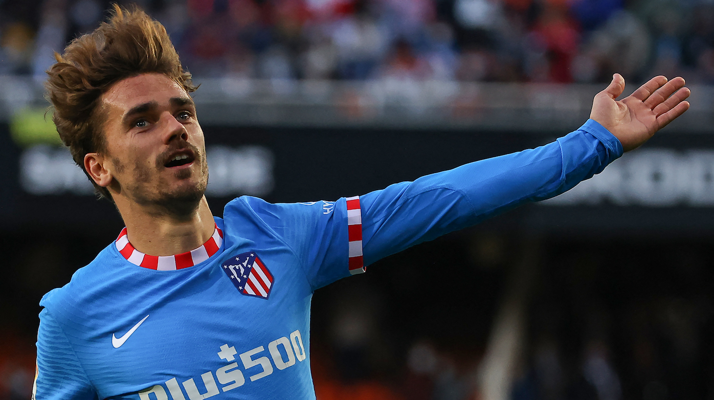 Atletico Madrid's French forward Antoine Griezmann celebrates after scoring his team's second goal during the Spanish league football match between Valencia CF and Club Atletico de Madrid at the Mestalla stadium in Valencia on November 7, 2021.
