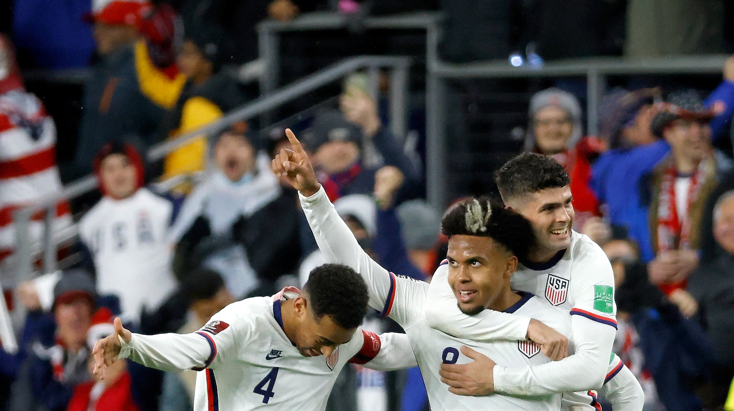 Weston McKennie #8 of the United States is congratulated by Christian Pulisic #10 and Tyler Adams #4 after scoring a goal during the second half of the FIFA World Cup 2022 Qualifier match against Mexico at TQL Stadium on November 12, 2021 in Cincinnati, Ohio. The United States defeated Mexico 2-0.