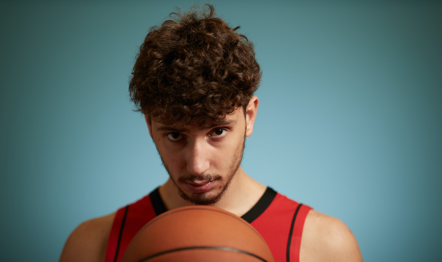 LAS VEGAS, NEVADA - AUGUST 14: Alperen Sengun #28 of the Houston Rockets poses for a portrait during the 2021 NBA rookie photo shoot on August 14, 2021 in Las Vegas, Nevada. (Photo by Joe Scarnici/Getty Images)